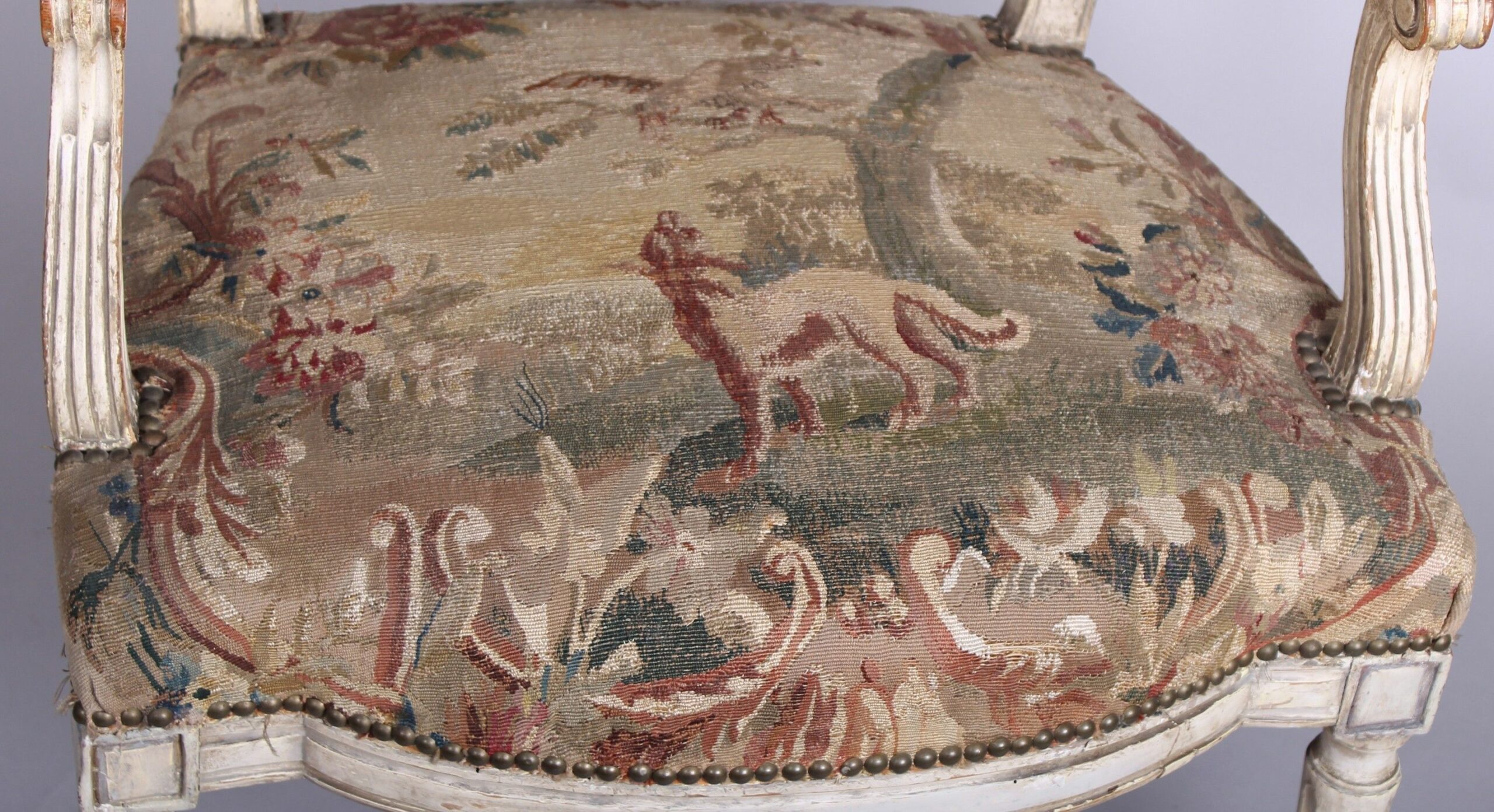 Pair of Louis XVI period white and gold painted fauteuils with Aubusson tapestry covers