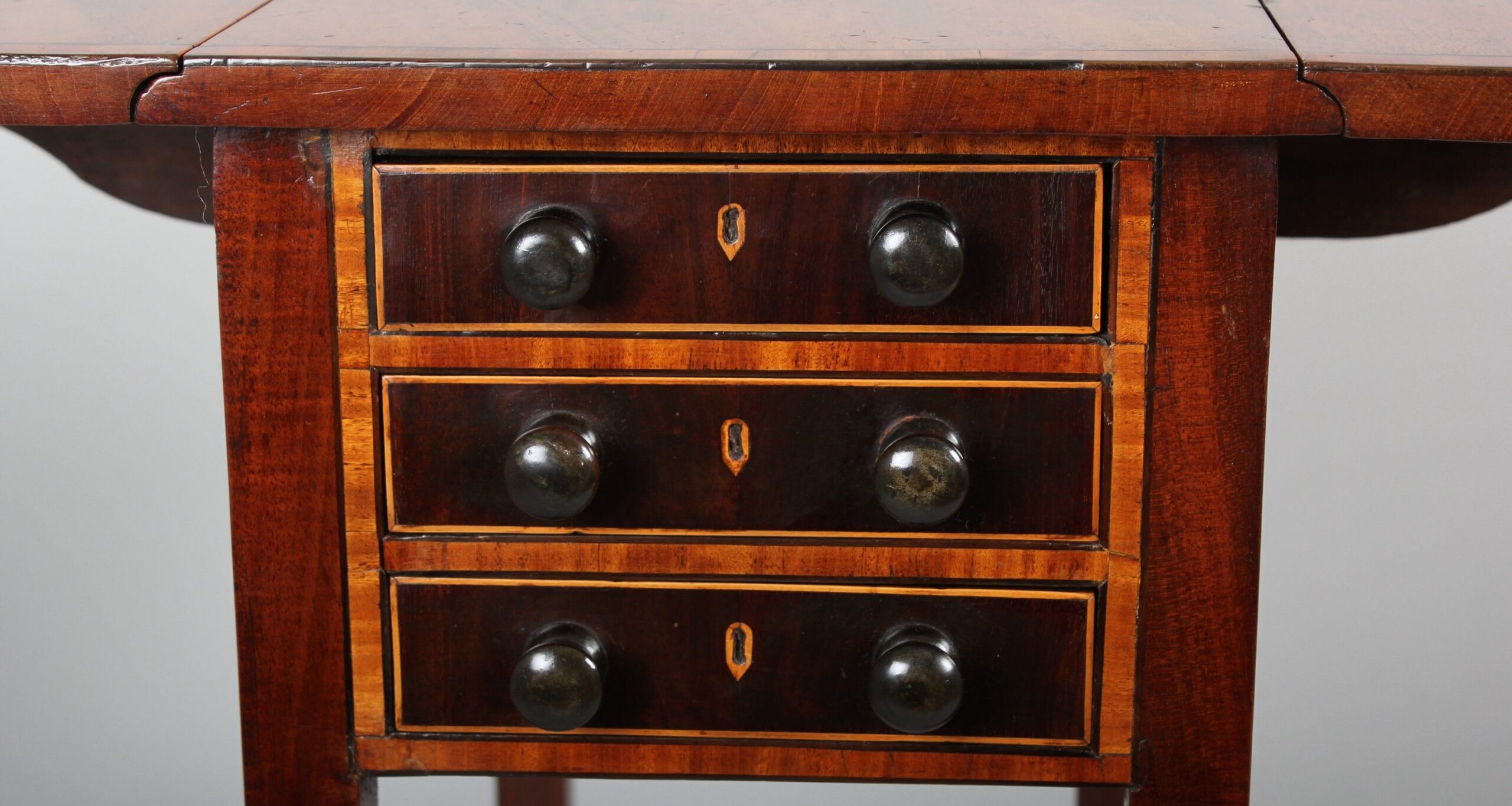 George III period mahogany and satinwood banded miniature Pembroke work-table