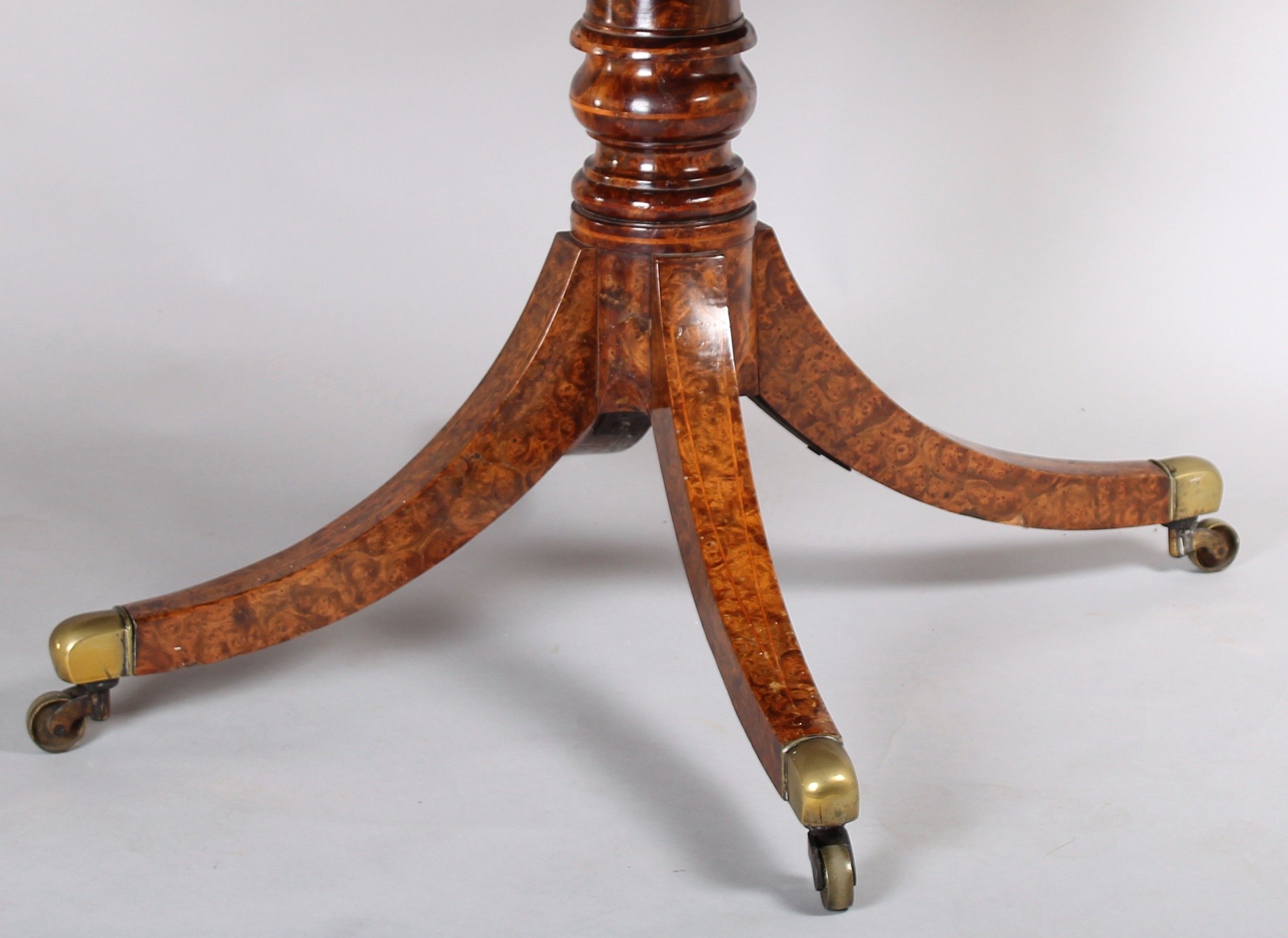 A spectacular Regency burr elm Pembroke table