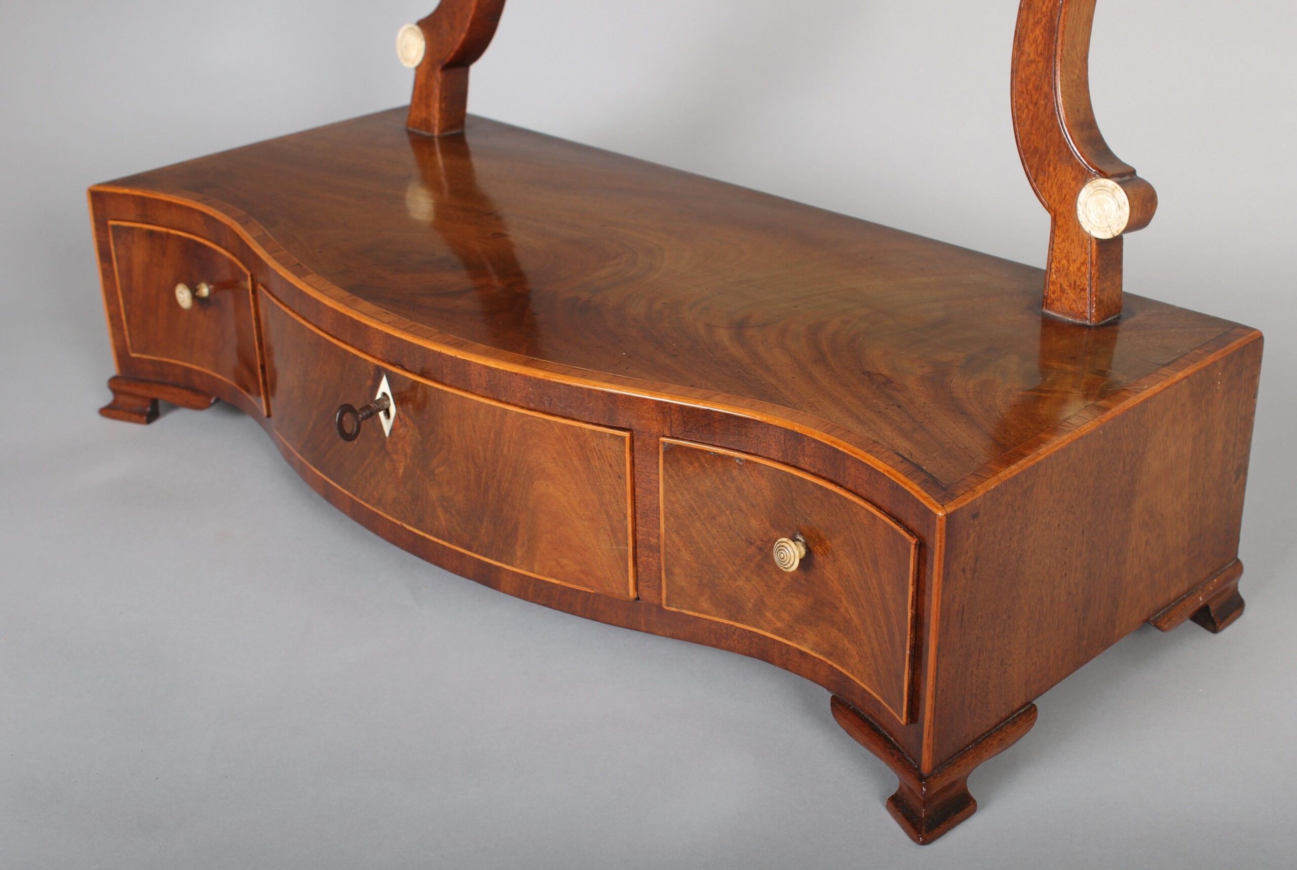 George III period mahogany toilet mirror of classic Hepplewhite style