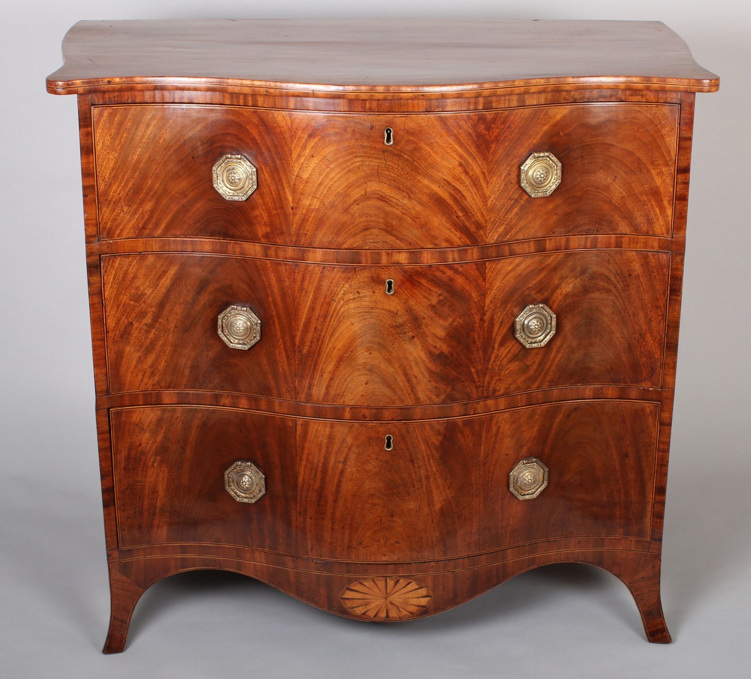 George III period mahogany serpentine fronted chest-of-drawers