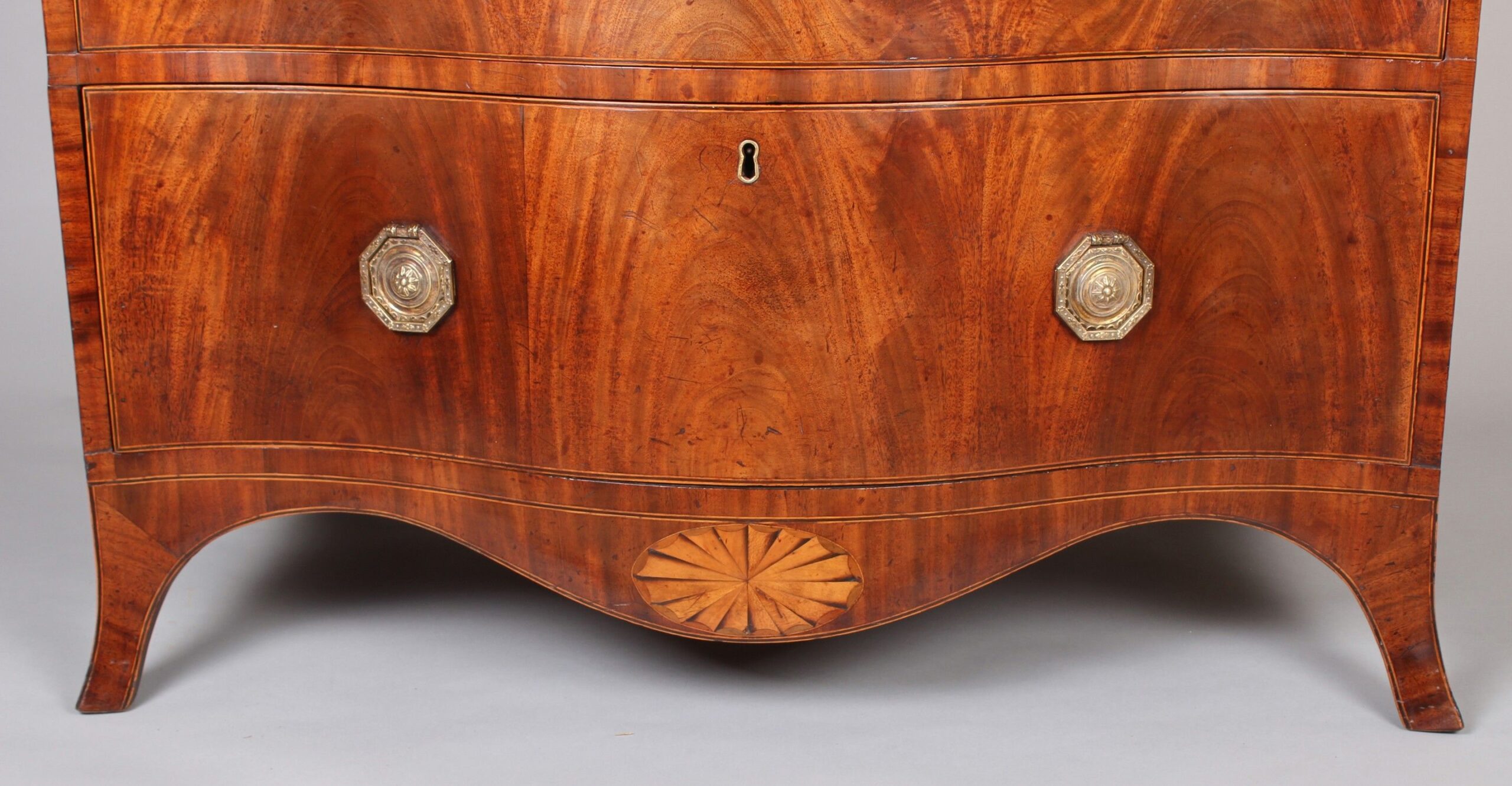 George III period mahogany serpentine fronted chest-of-drawers