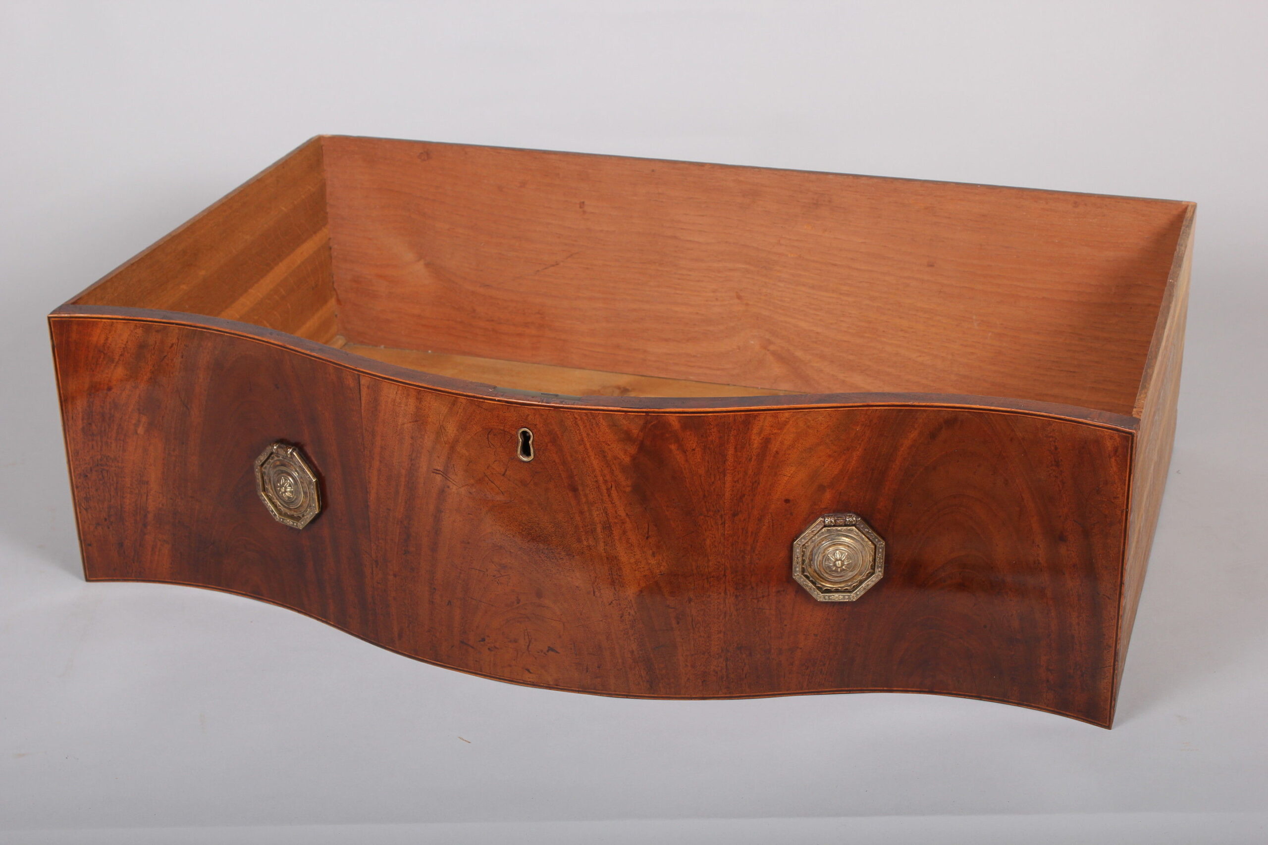 George III period mahogany serpentine fronted chest-of-drawers