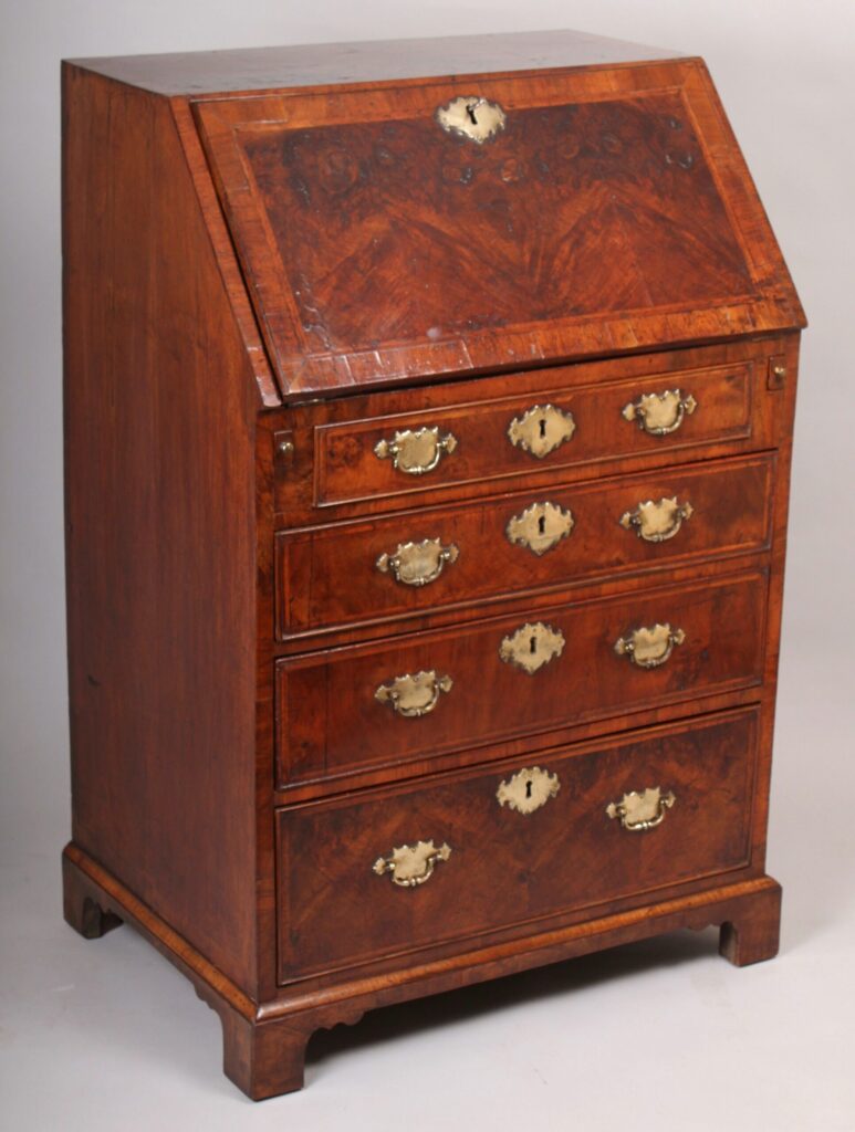 Small George I period walnut bureau