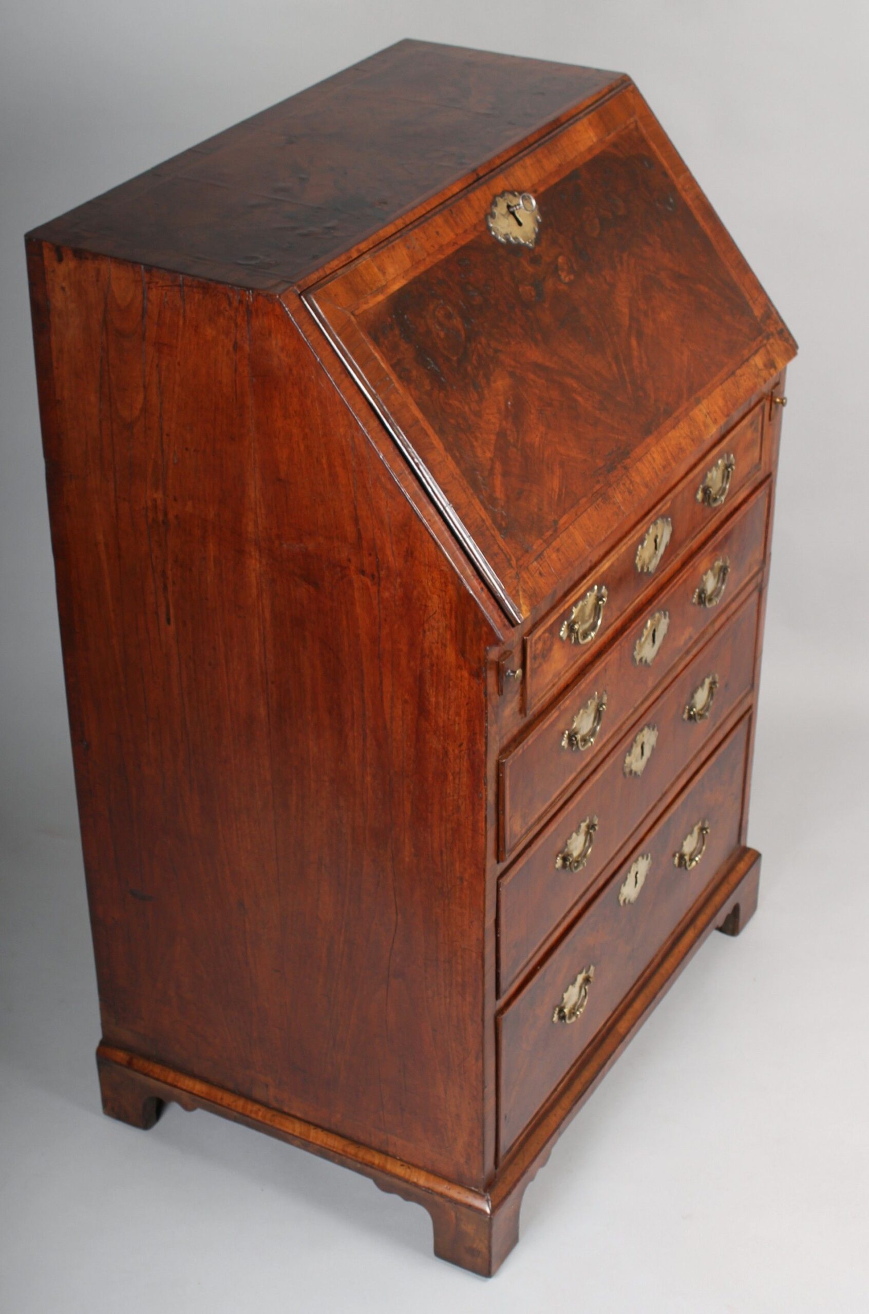 Small George I period walnut bureau