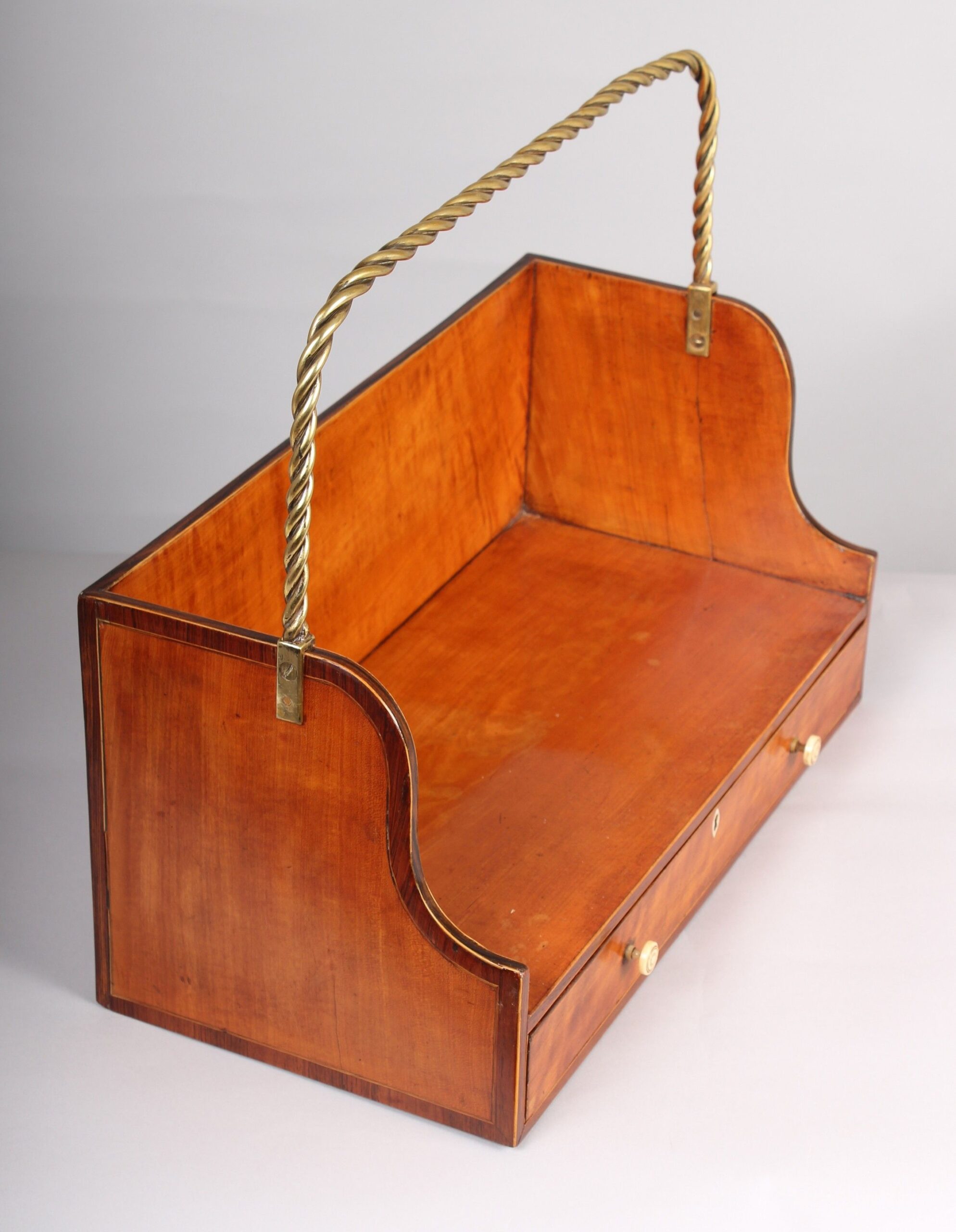 Fine and rare George III period satinwood book-carrier in the Sheraton manner