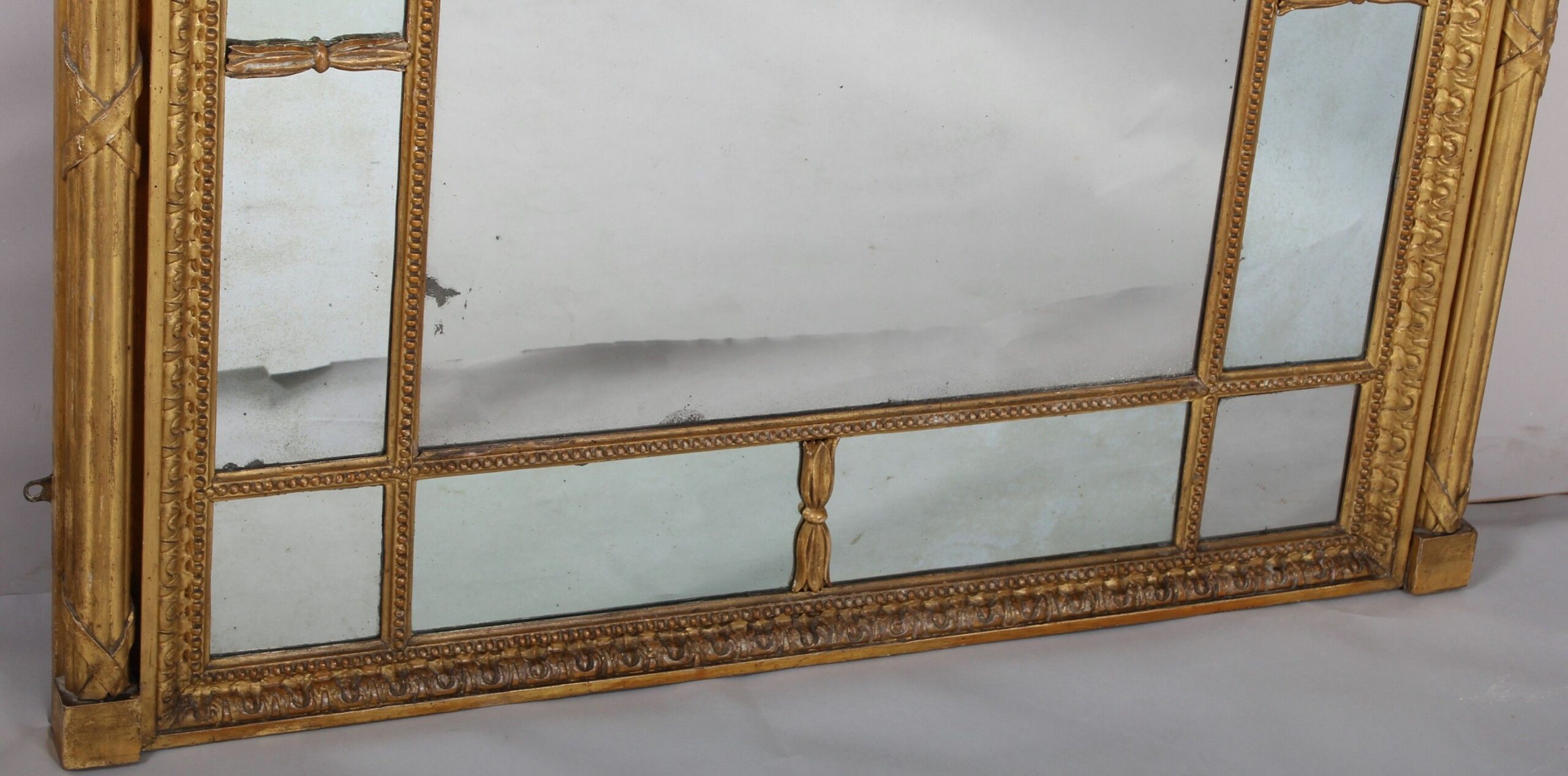 Fine and rare early 19th century gilded overmantel mirror in the neo-classical Adam manner by ‘Freeman of Norwich’