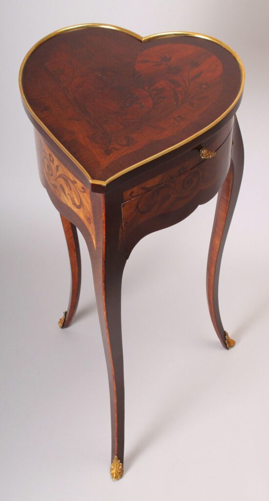 An unusual late 19th century French heart-shaped work-table of Louis XV character