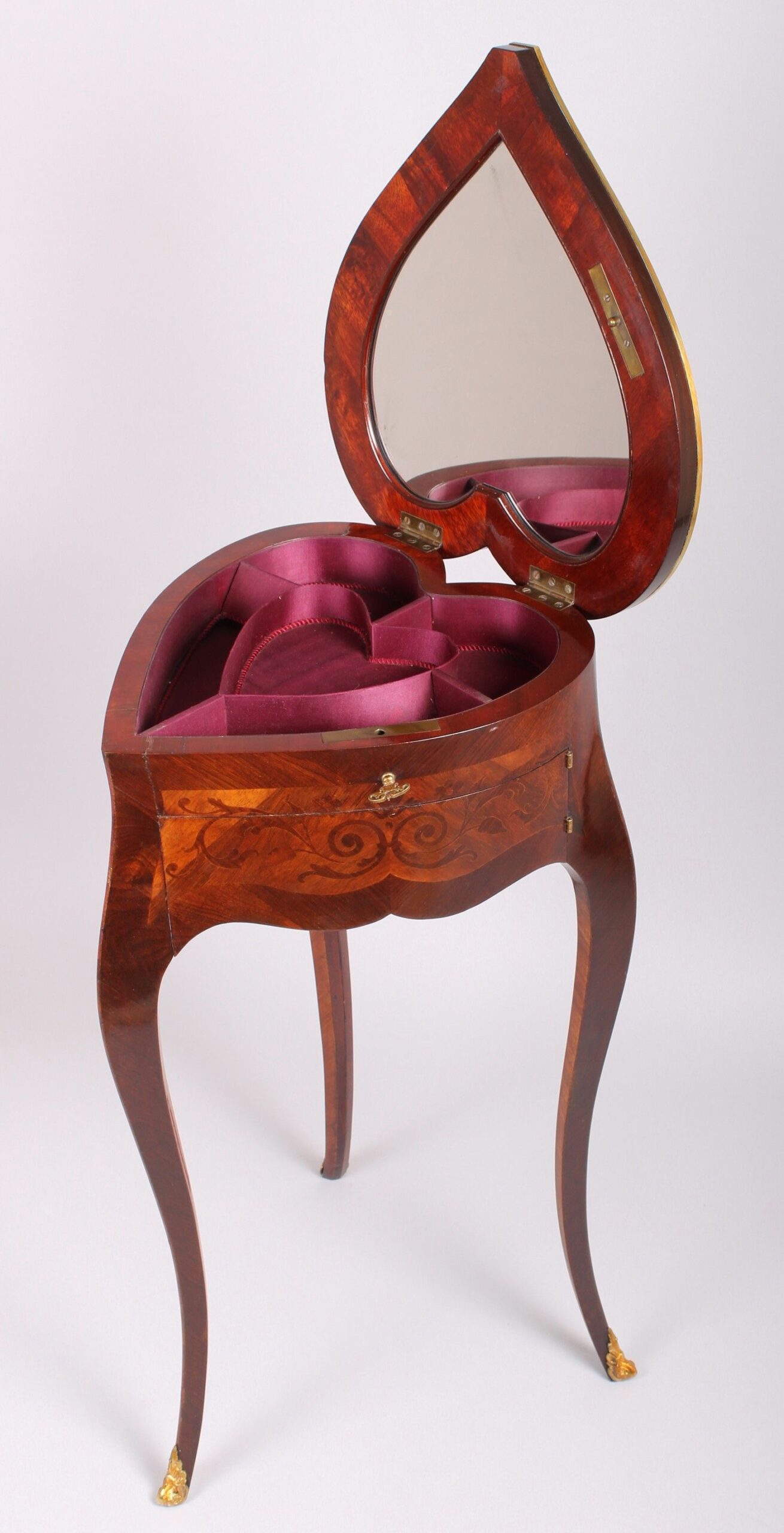 An unusual late 19th century French heart-shaped work-table of Louis XV character