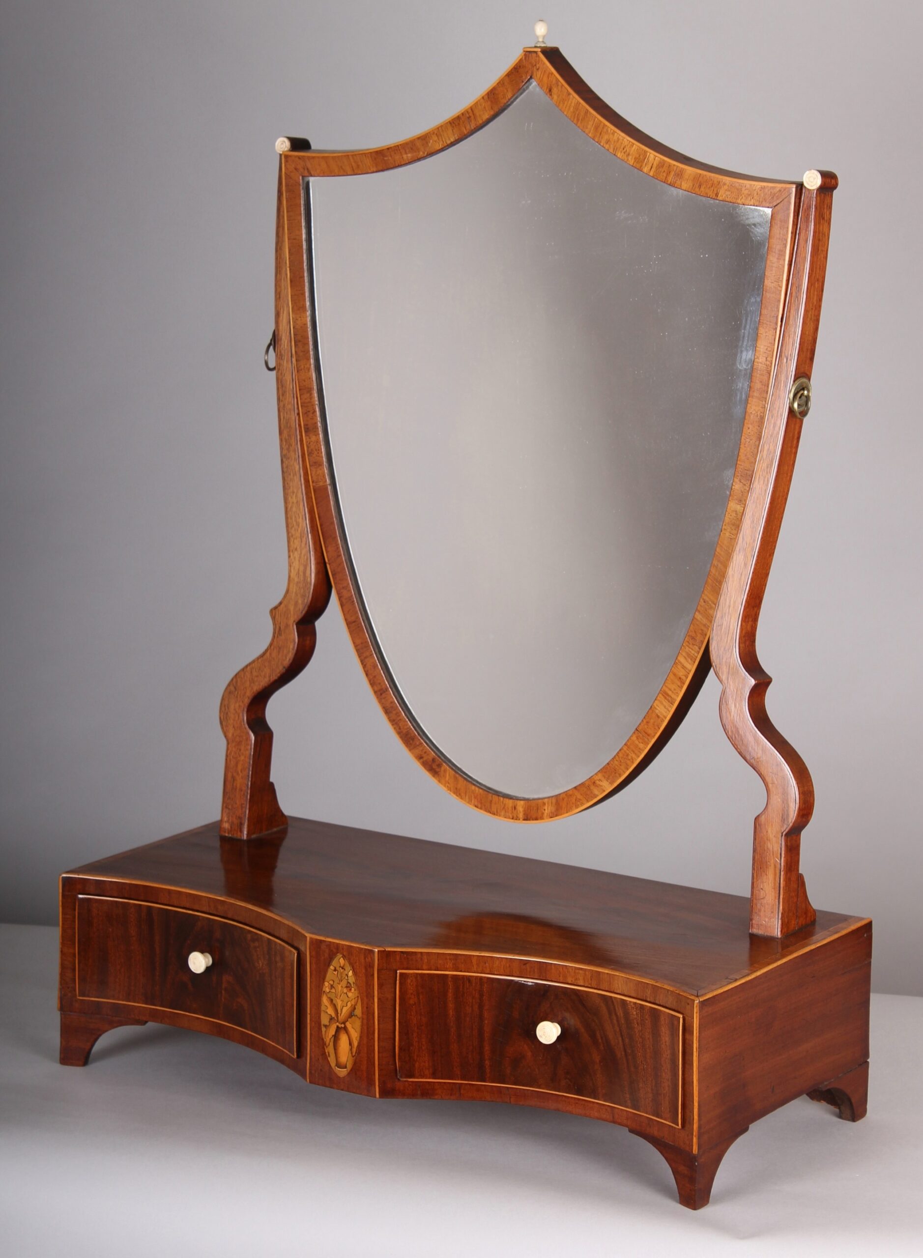 George III period mahogany toilet-mirror of unusual form and good quality