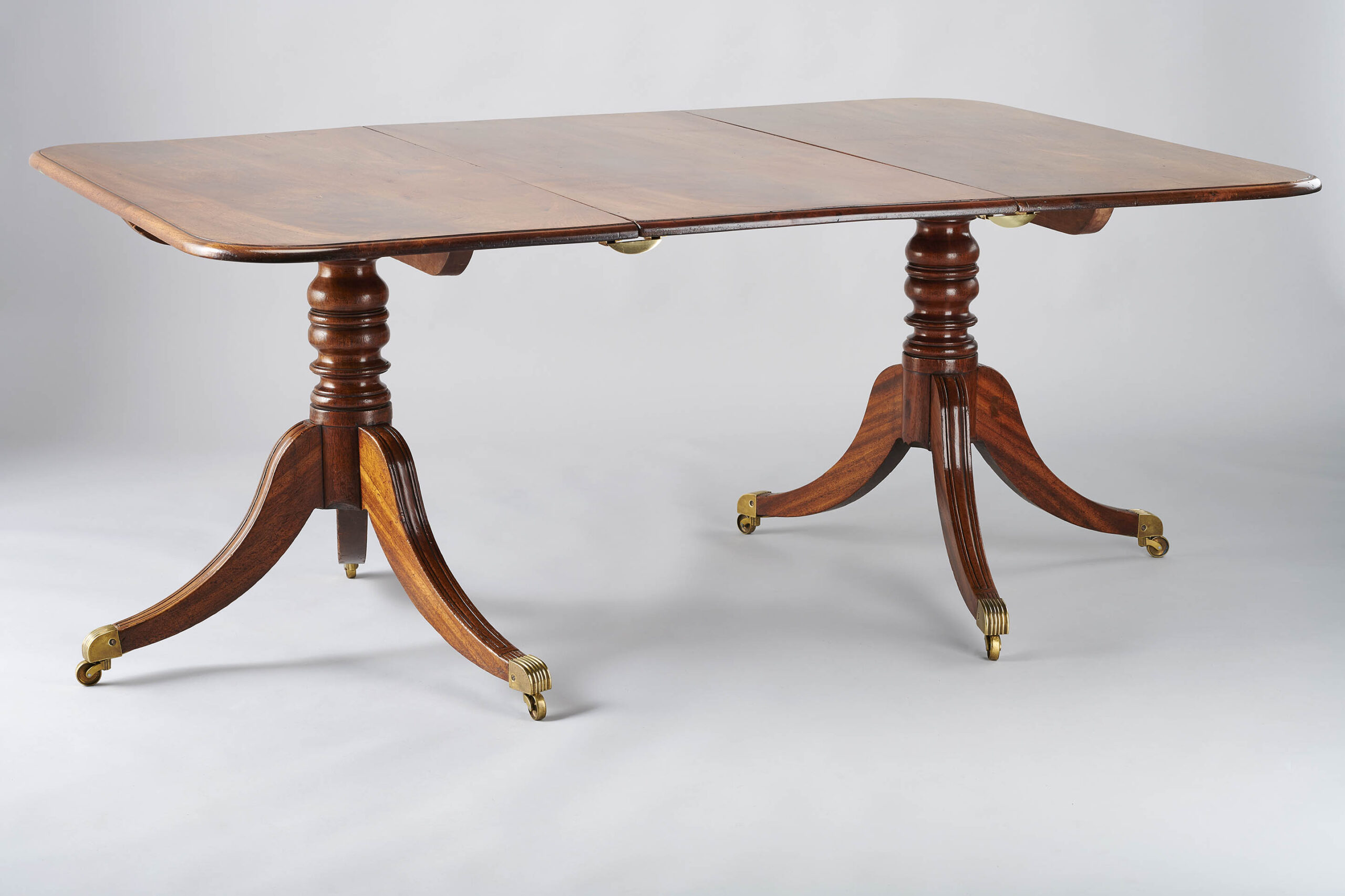 George IV period mahogany twin-pedestal dining-table