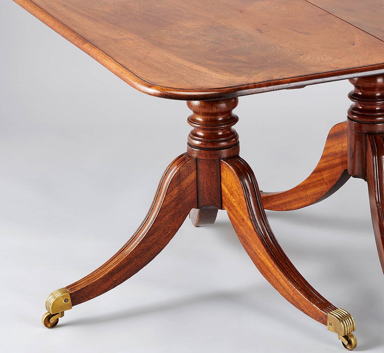 George IV period mahogany twin-pedestal dining-table