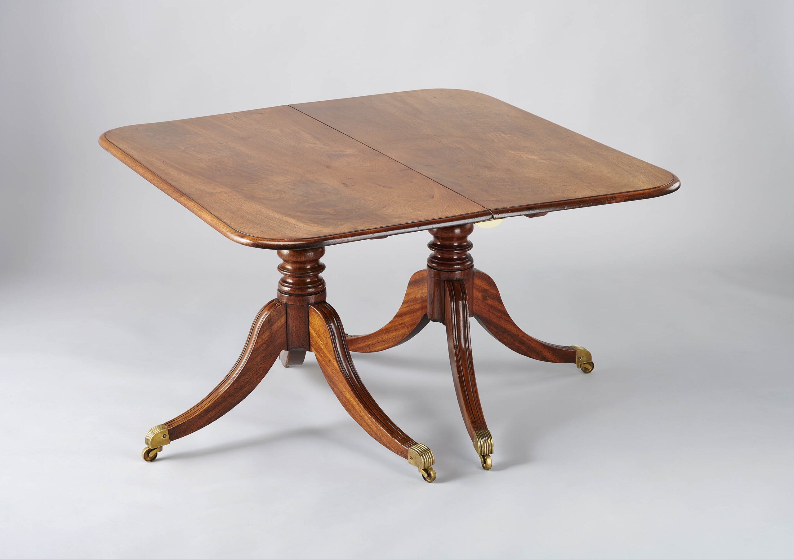 George IV period mahogany twin-pedestal dining-table