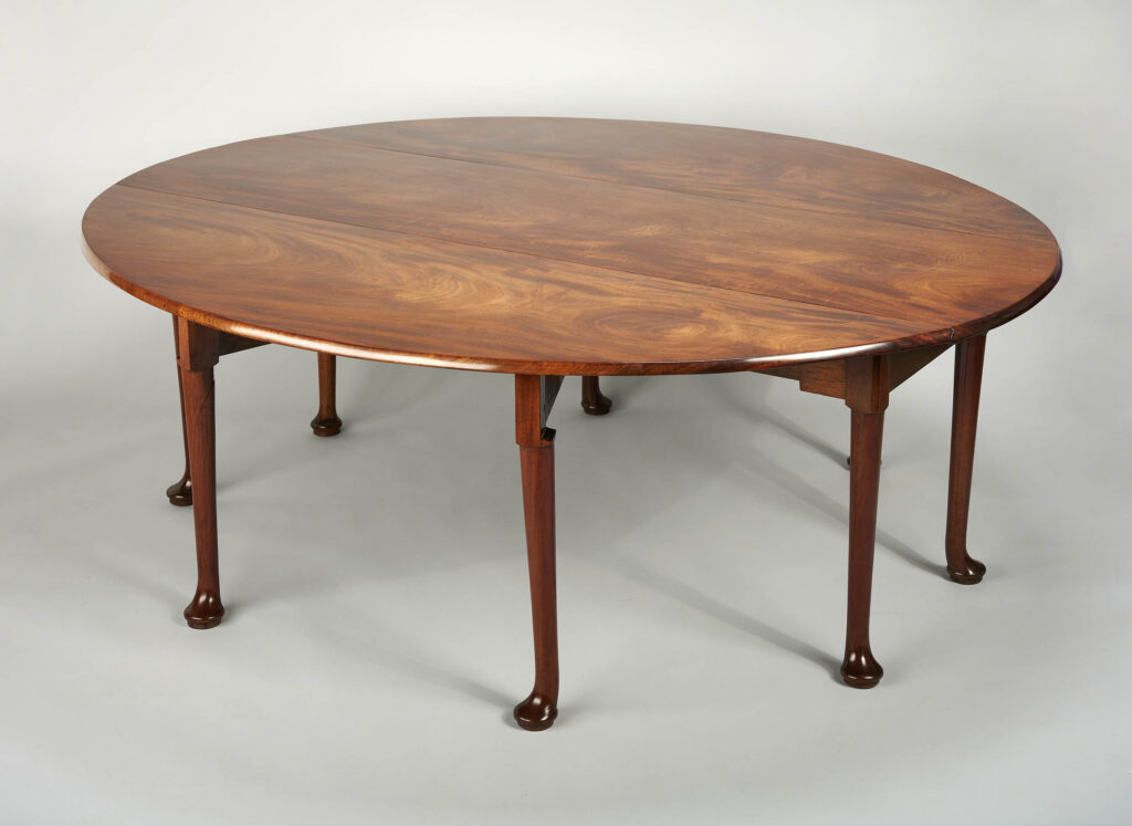 Exceptional mid-eighteenth century oval drop leaf dining-table