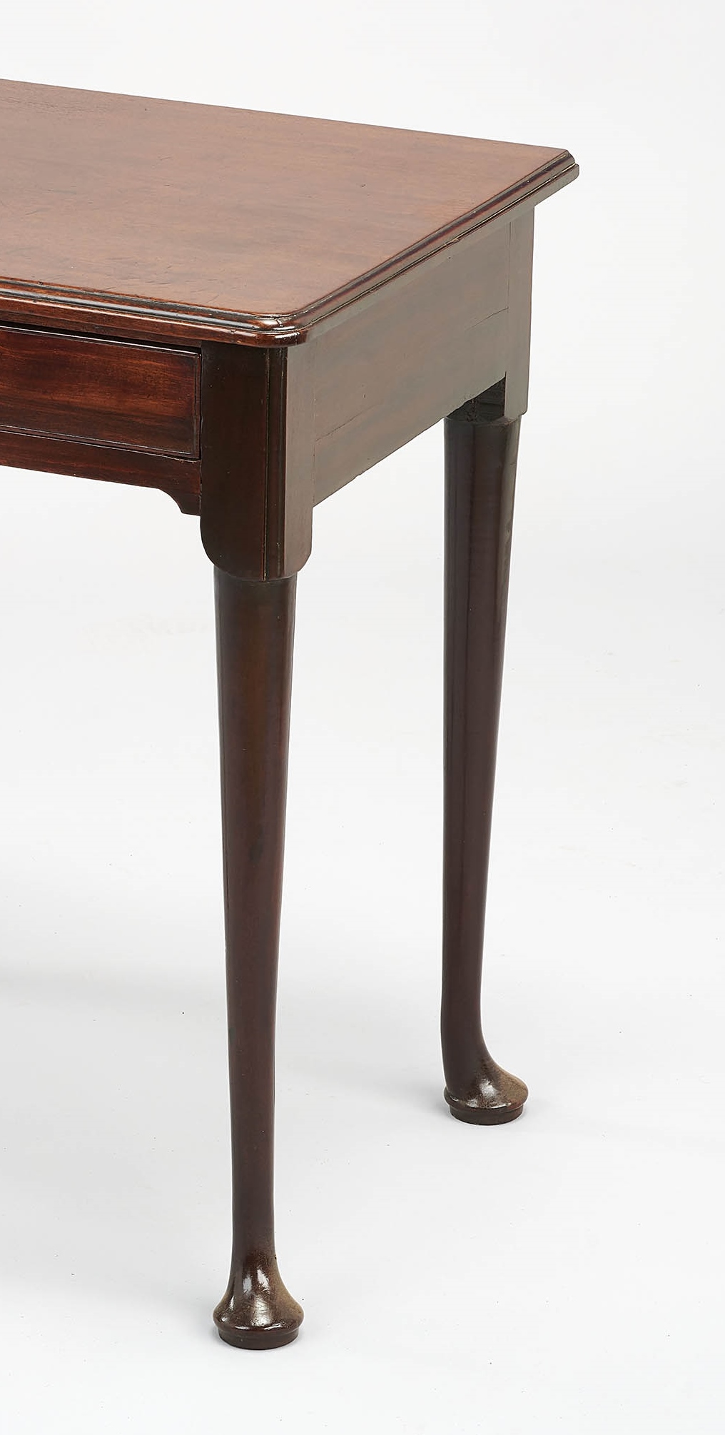 A matched pair of George II period ‘red walnut’ side-tables