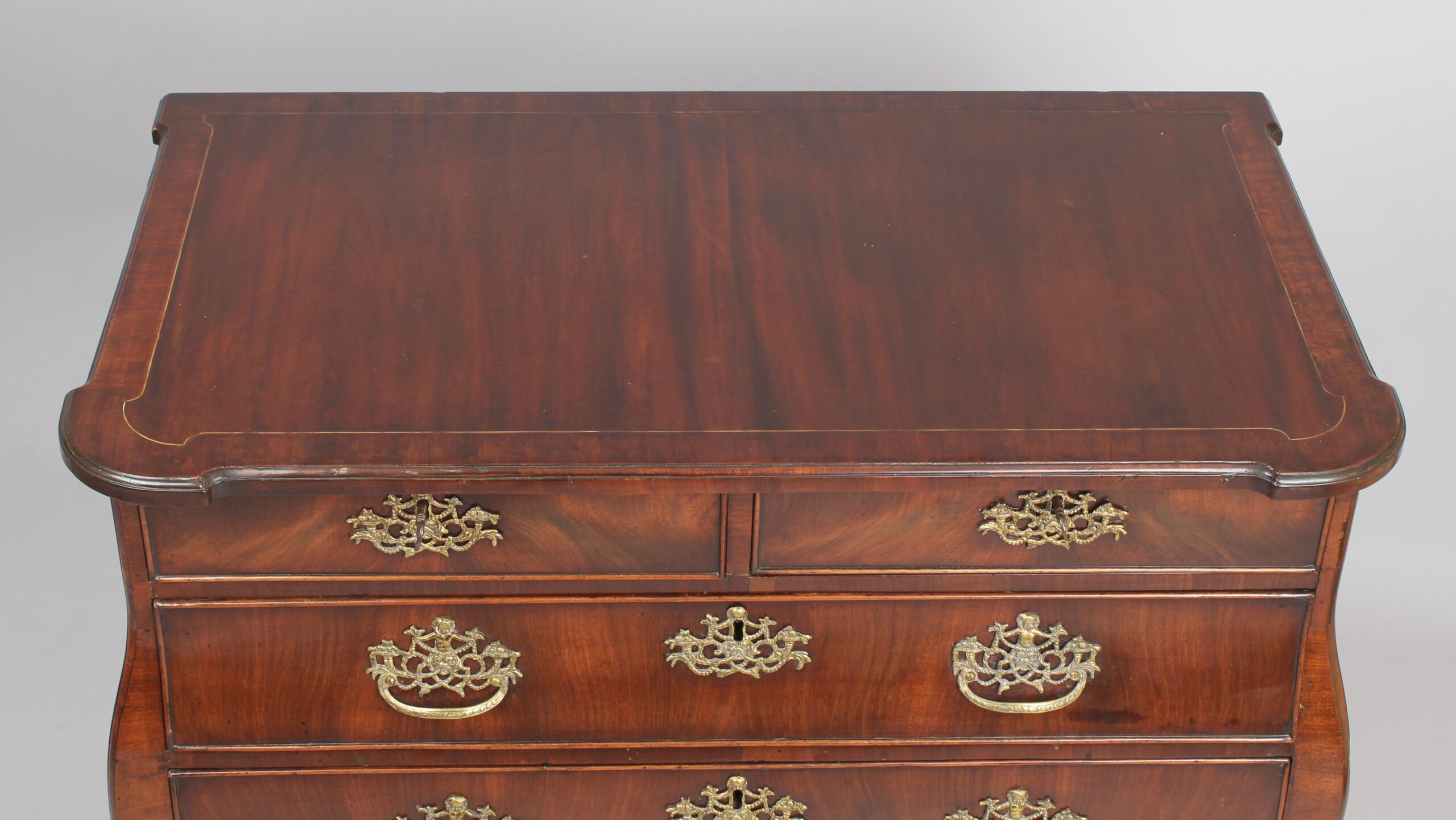 Small Dutch mahogany bombe commode chest