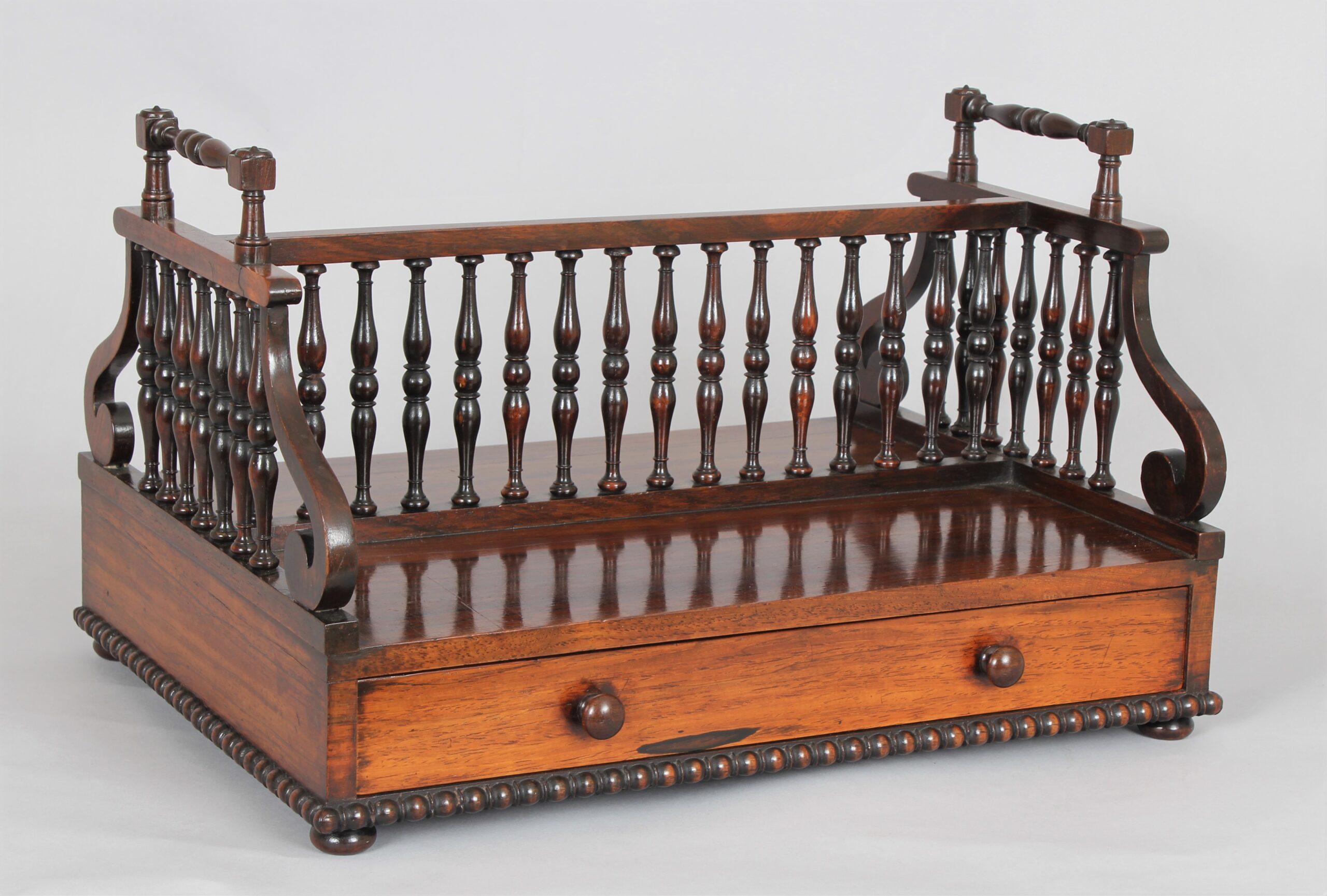 A fine Regency period rosewood book carrier in the manner of Gillows of Lancaster R