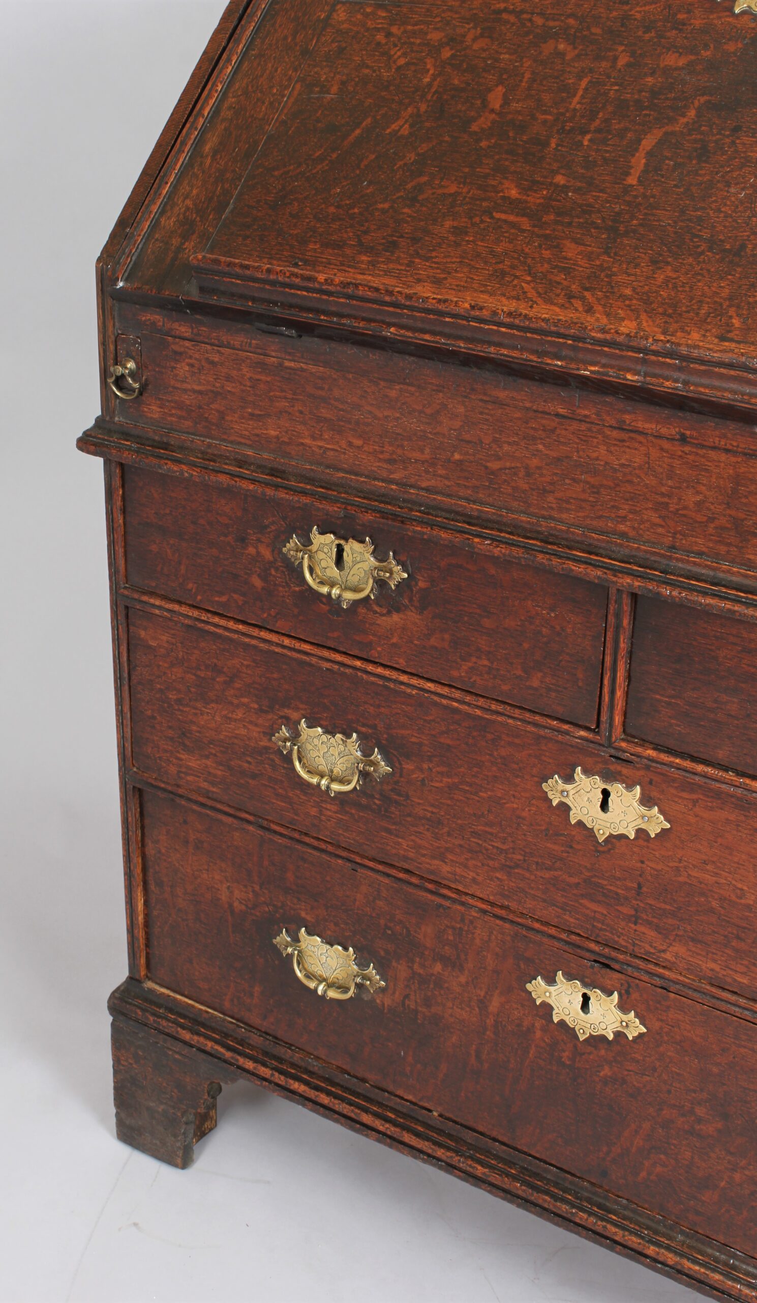An Early 18th century oak bureau