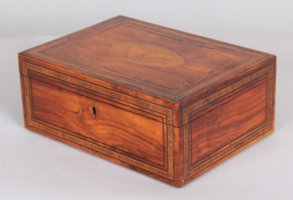 A satinwood jewellery box  R