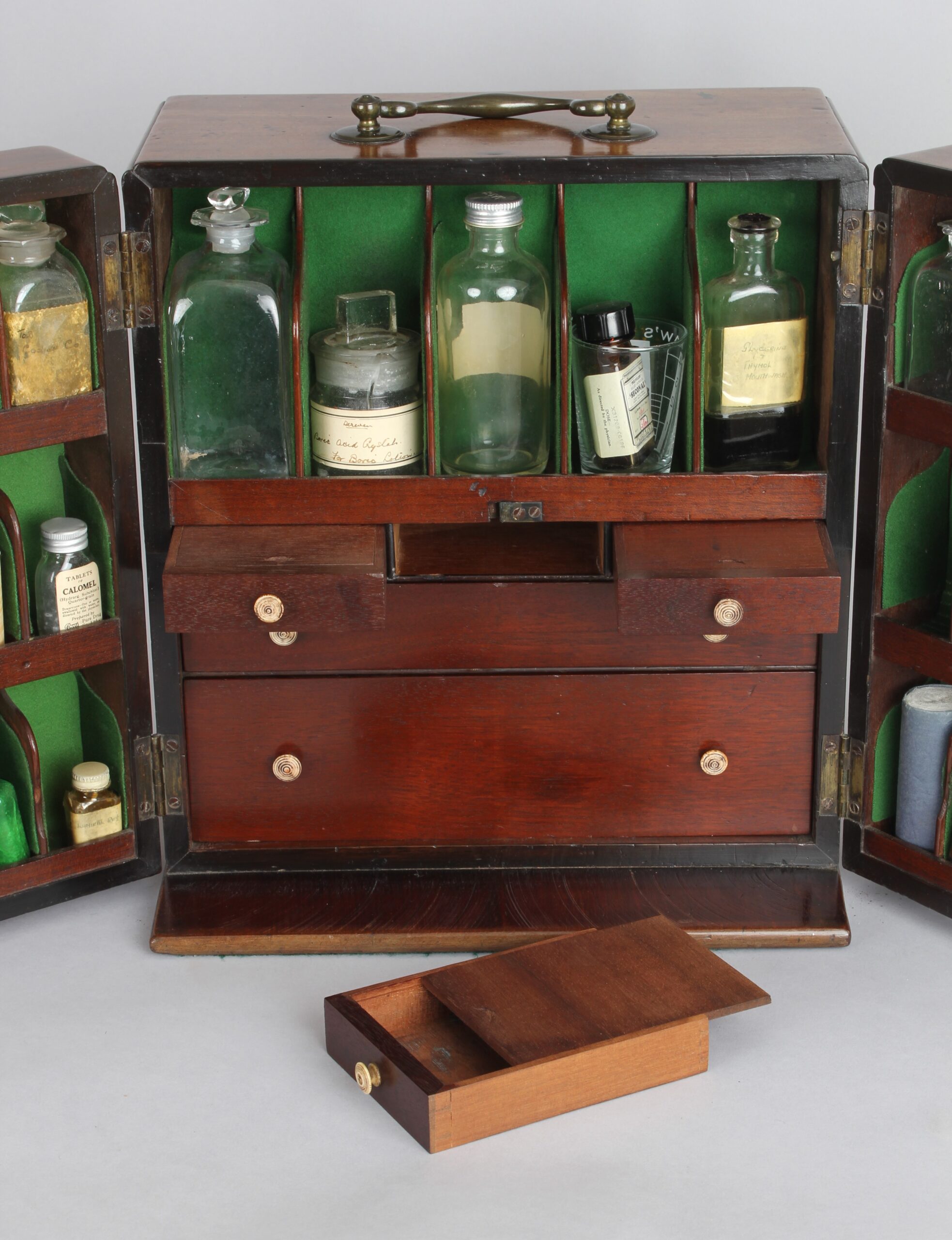 Early 19th century mahogany apothecary cabinet