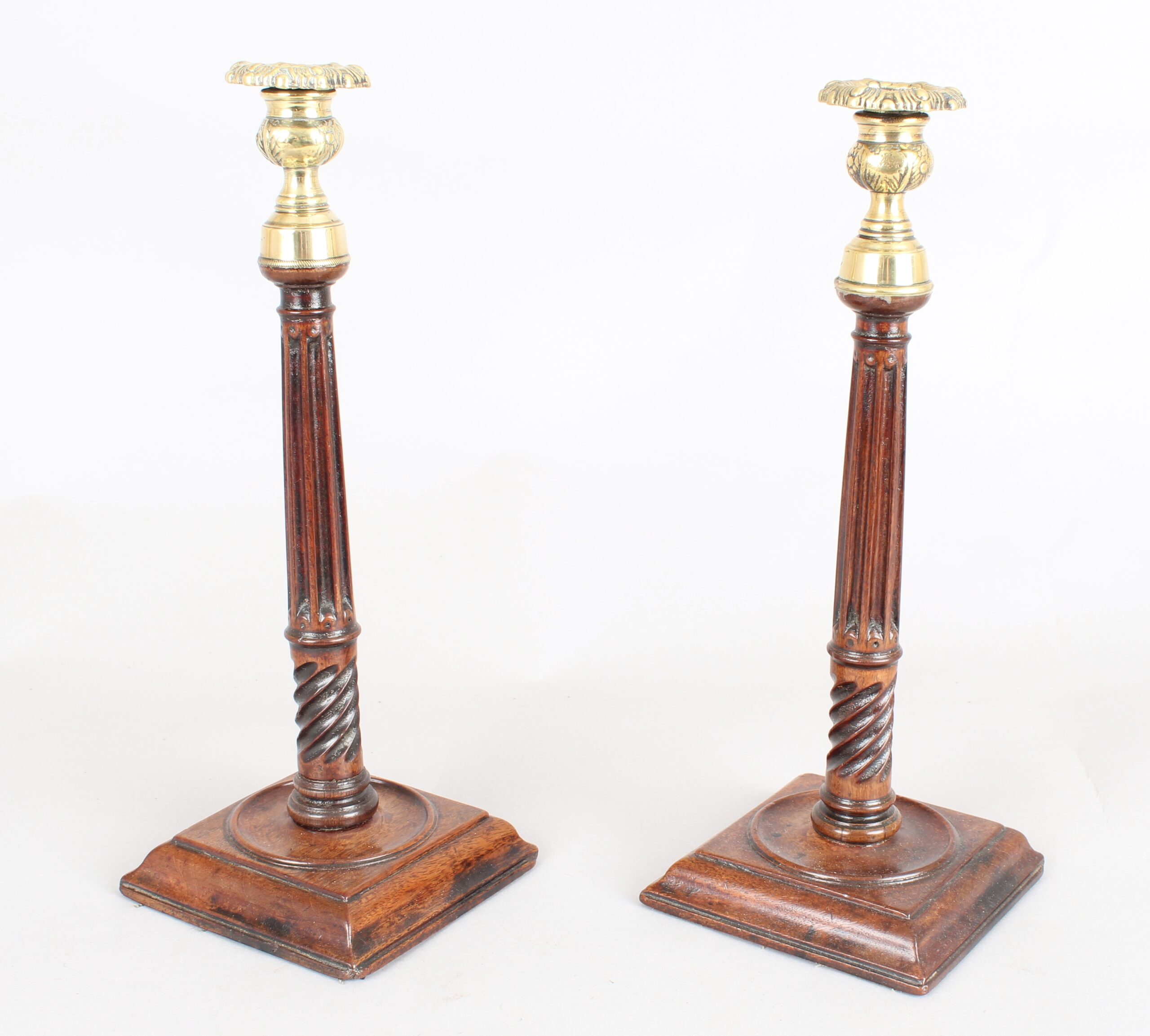 Rare pair of George III mahogany candlesticks