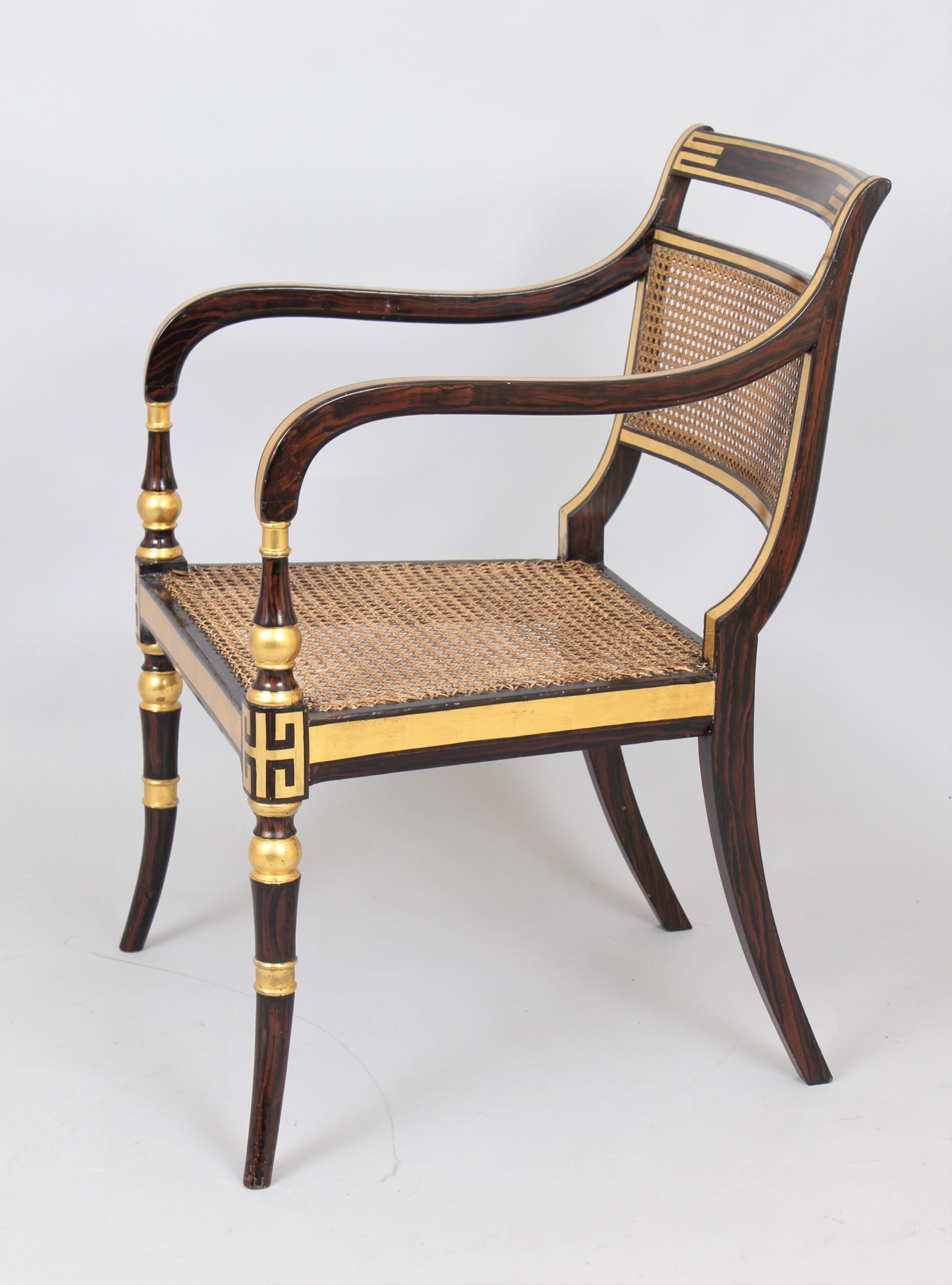 Early 19th century decorated open arm chair