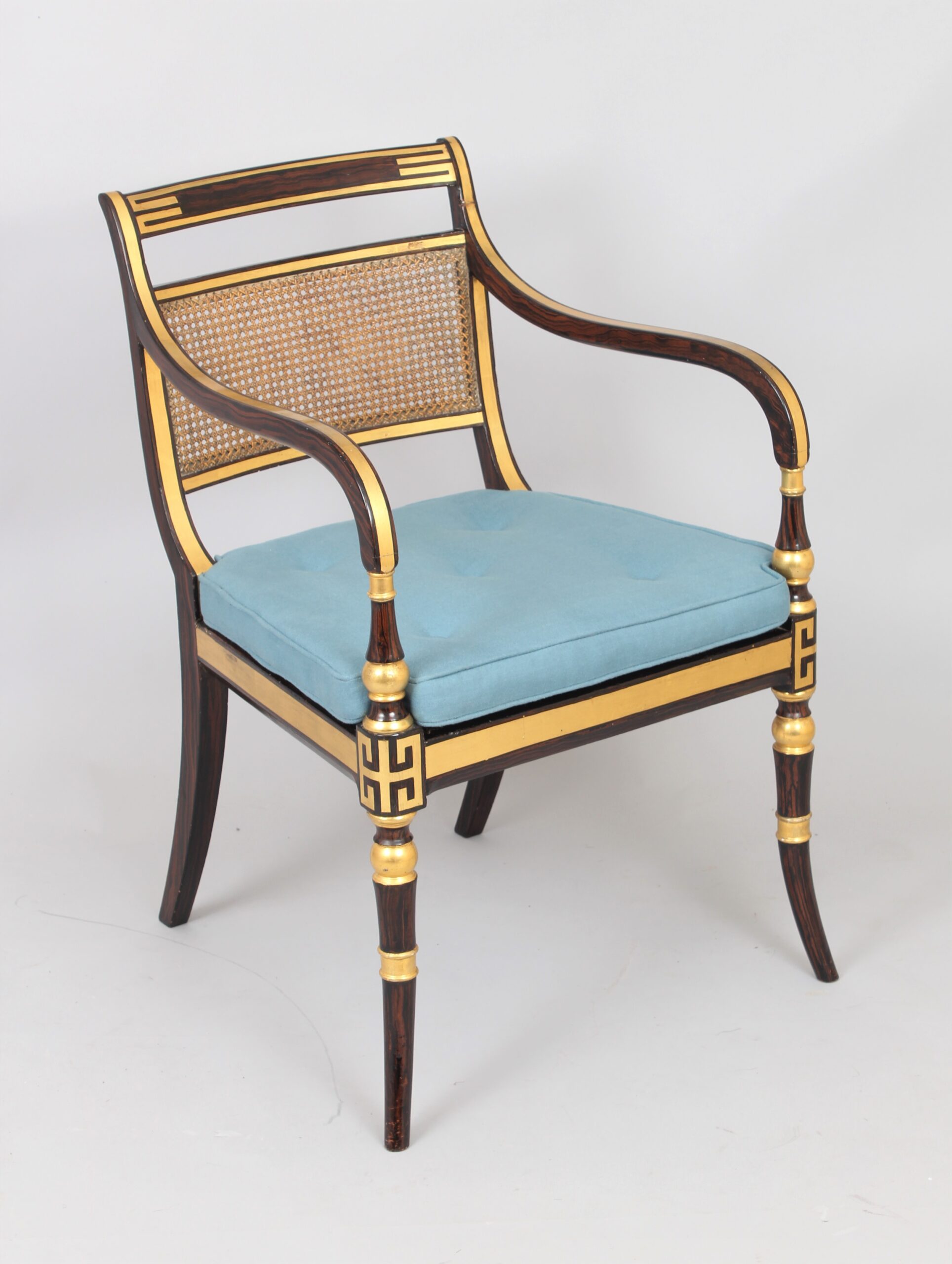 Early 19th century decorated open arm chair