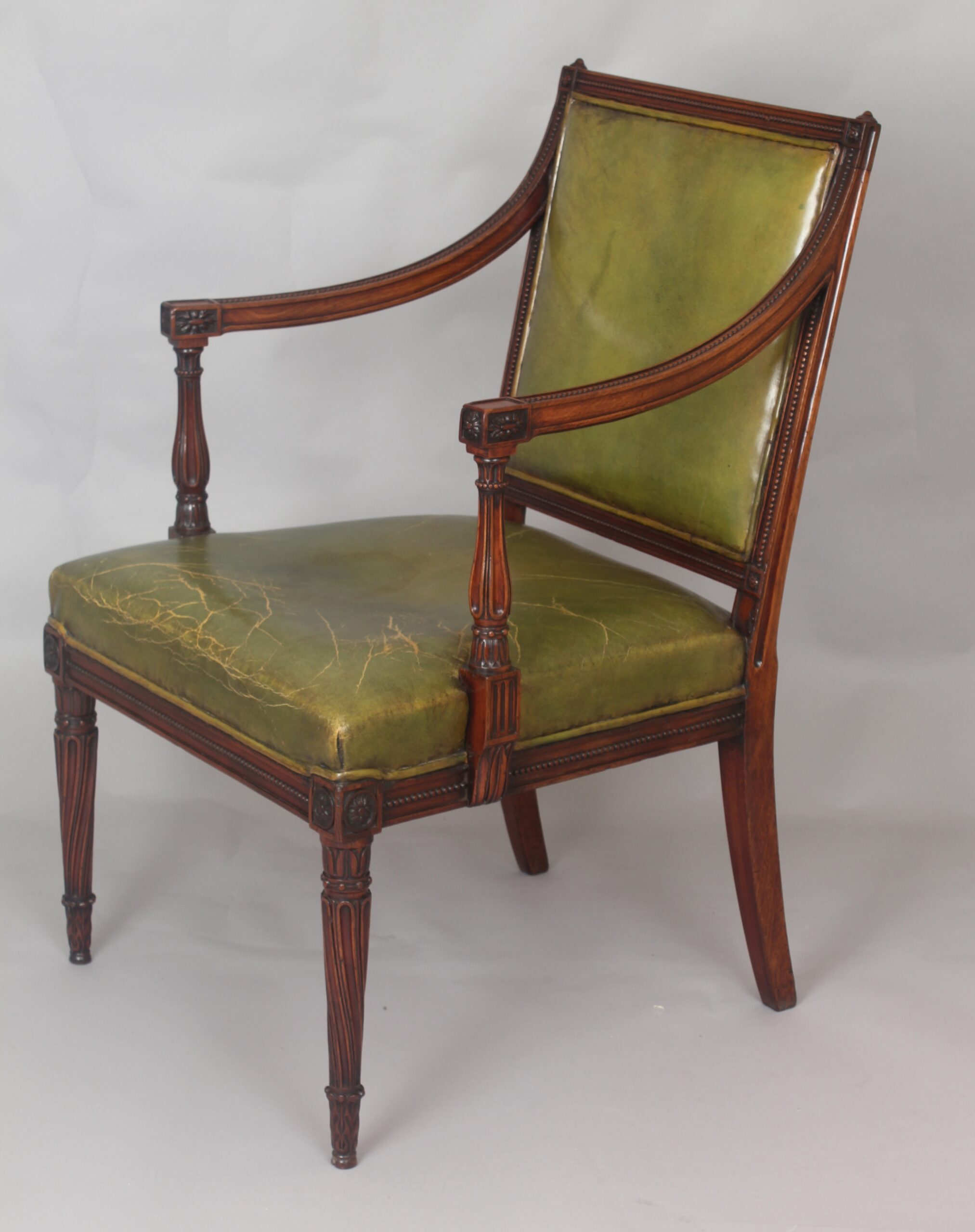 Very fine George III period mahogany open arm chair