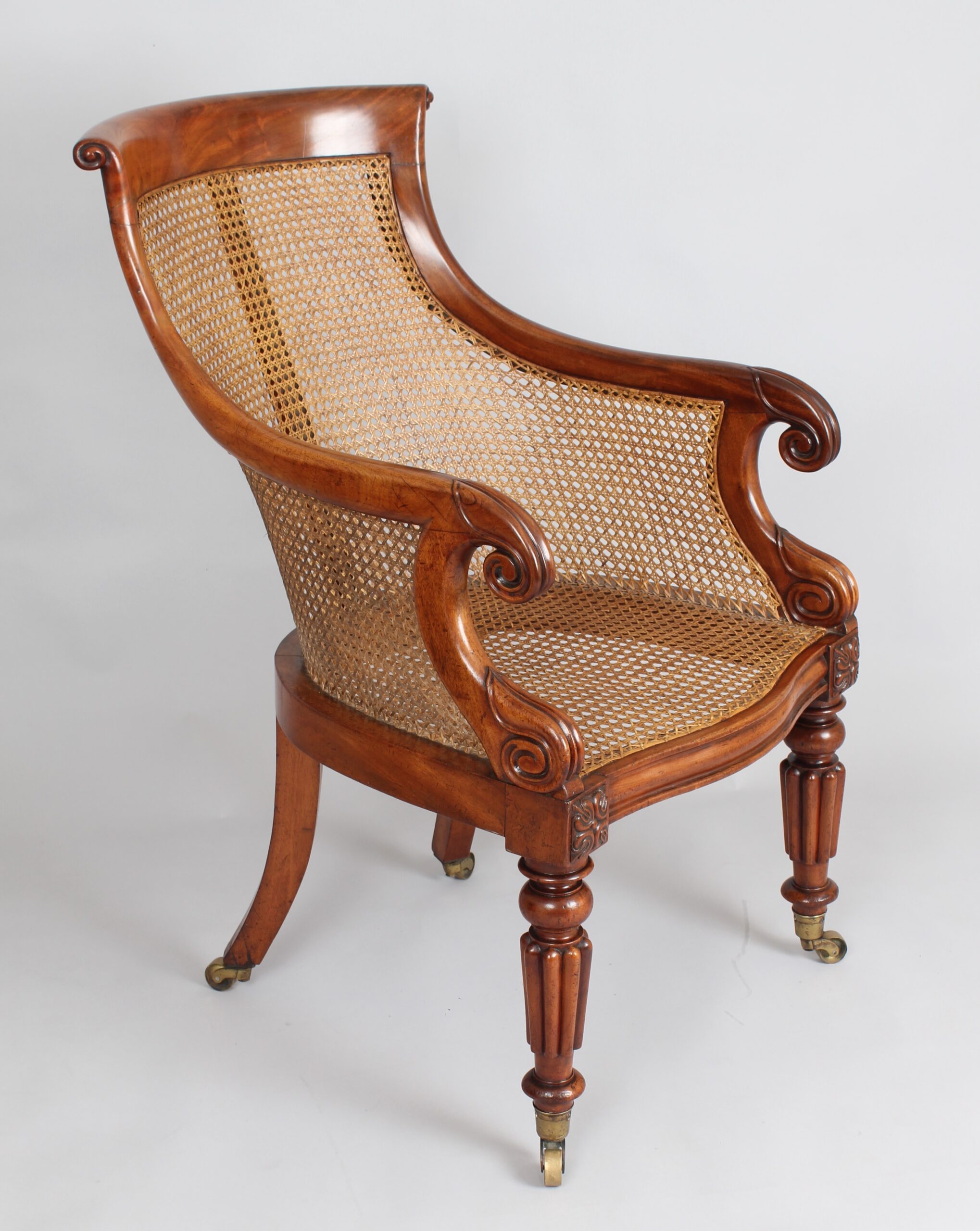 William IV period mahogany curricle bergère chair