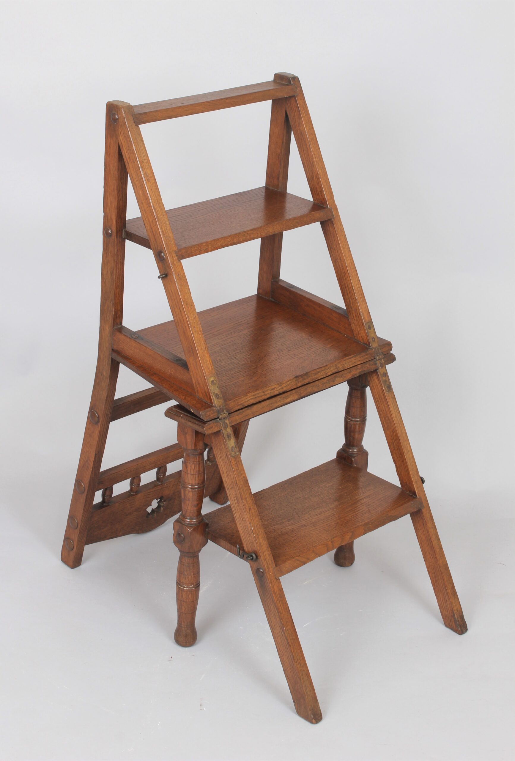 Metamorphic oak library steps chair