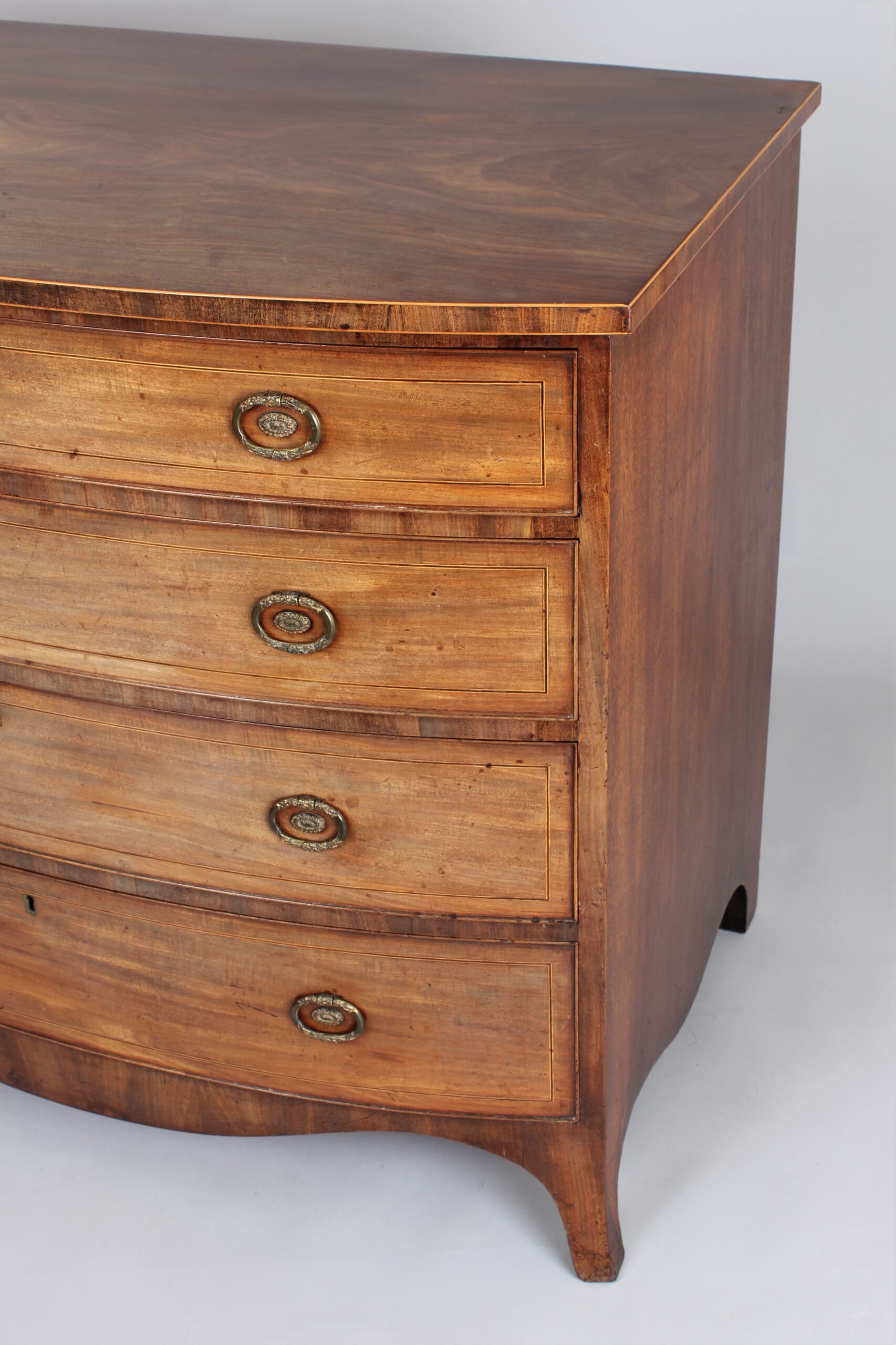 George III period mahogany bow fronted chest of drawers in the manner of Gillows of Lancaster