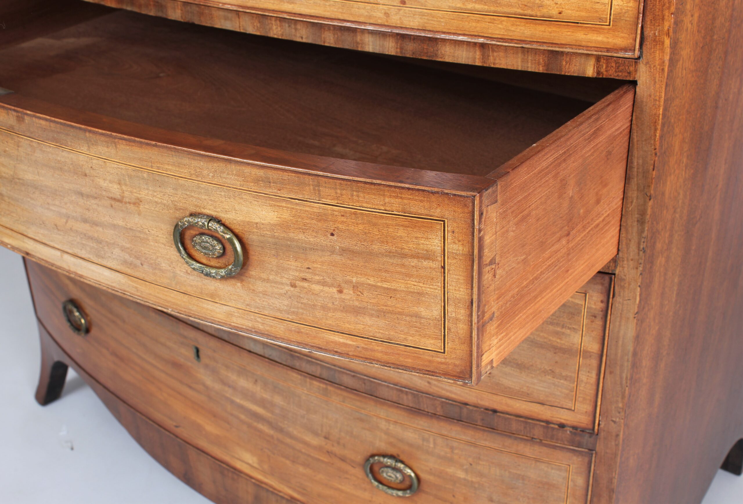 George III period mahogany bow fronted chest of drawers in the manner of Gillows of Lancaster