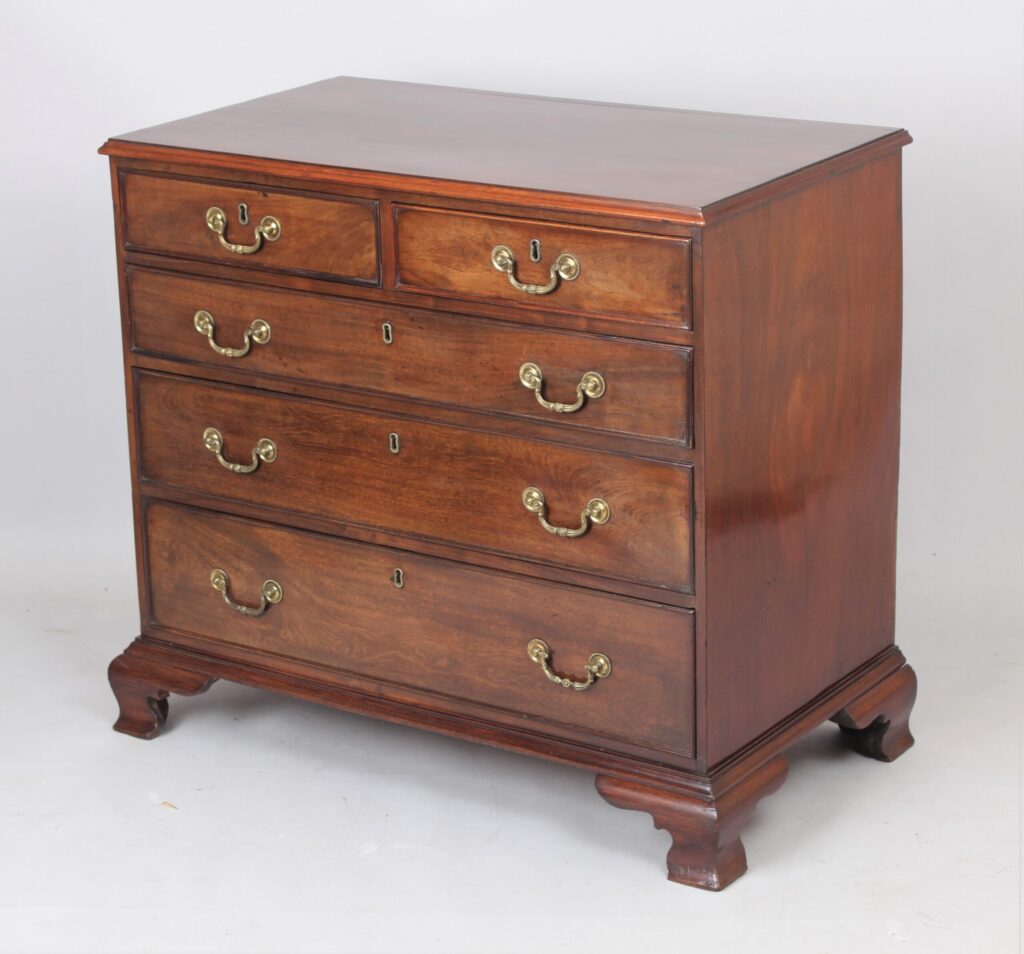 George III mahogany chest of two short and three long graduated and cock-beaded drawers