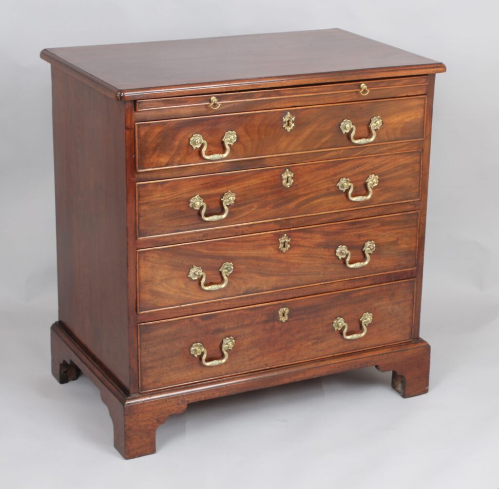 Small George III mahogany chest of four graduated drawers