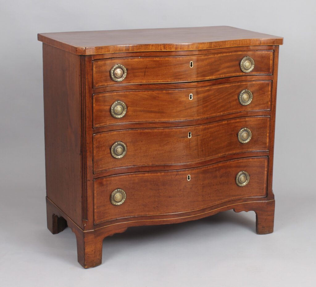 Late 18th century mahogany serpentine chest of drawers only 34” wide