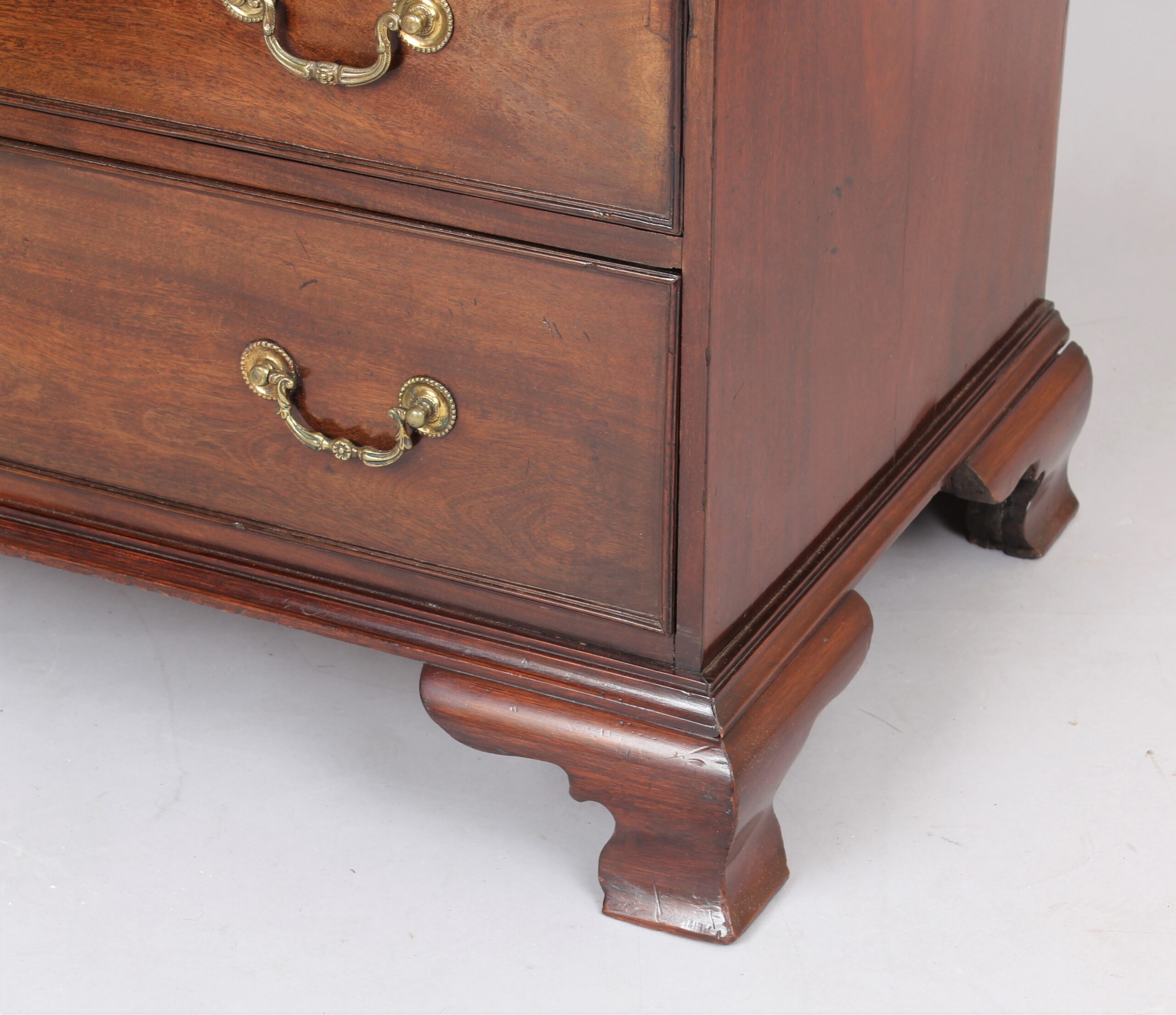 George III mahogany chest of two short and three long graduated and cock-beaded drawers