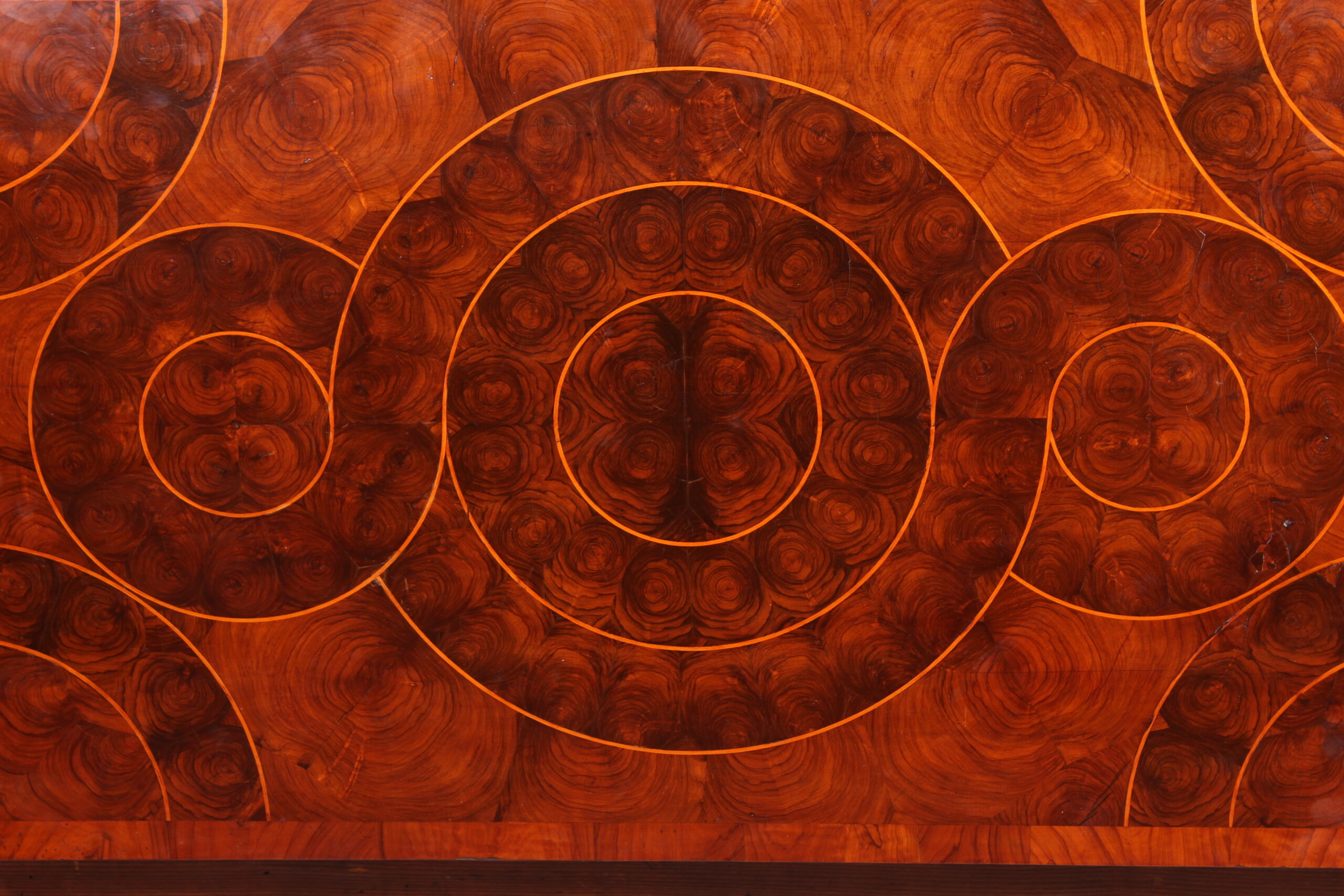 A fine and rare walnut oyster-piece chest-on-stand