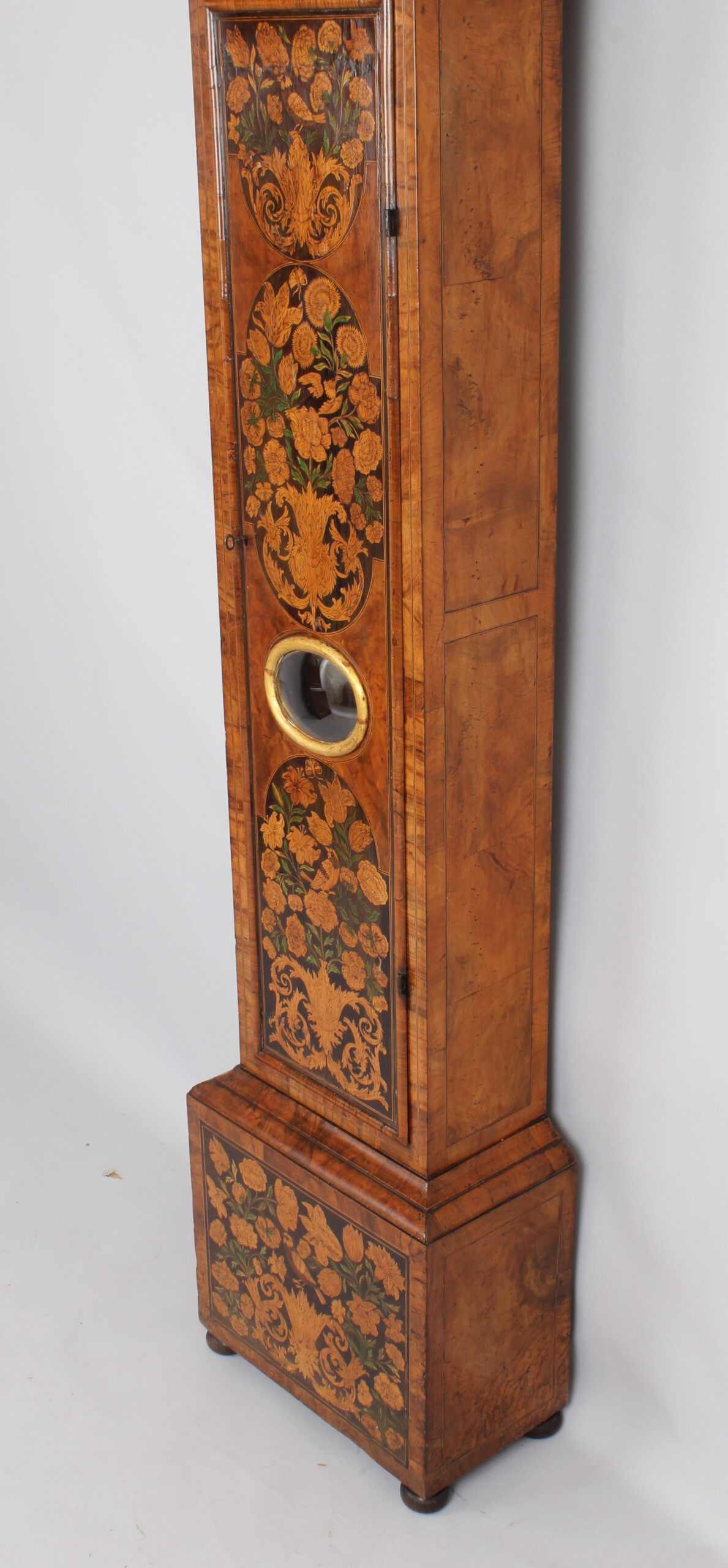 A walnut marquetry long-case clock