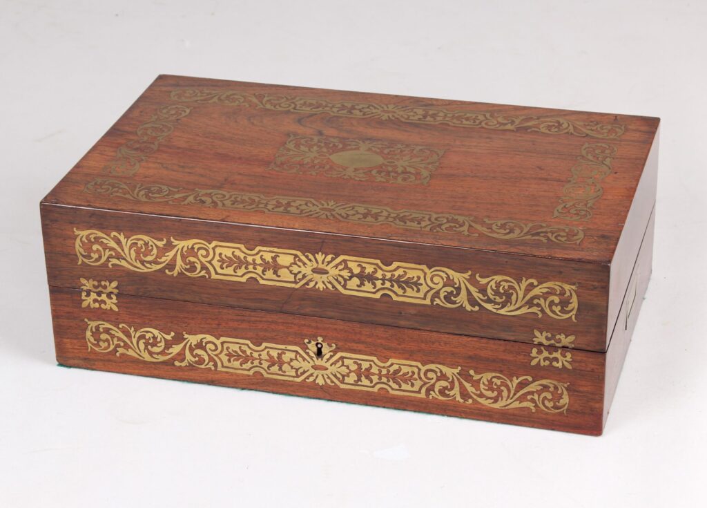 A most unusual early Victorian games compendium in rosewood