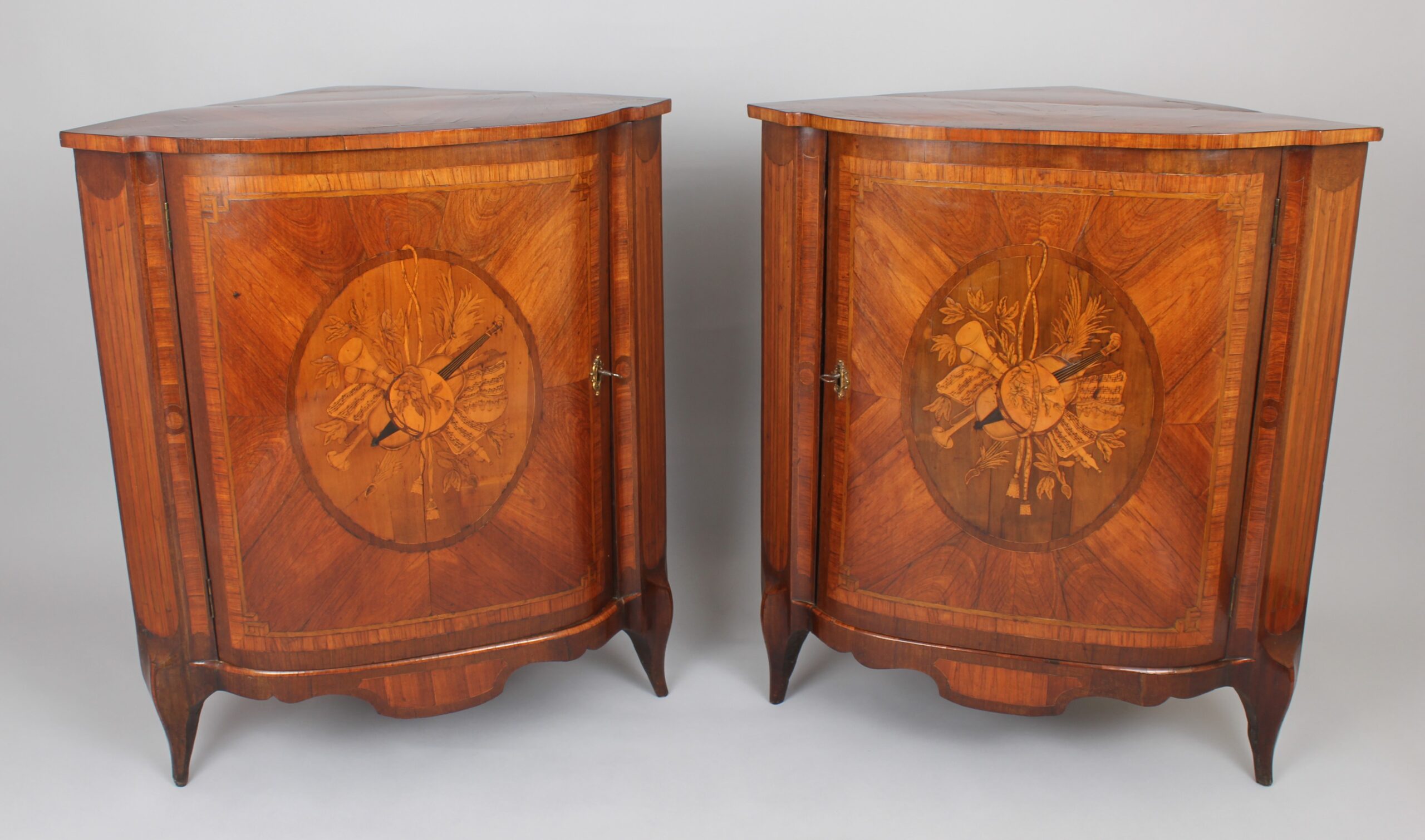Rare pair of late eighteenth century Dutch kingwood and marquetry corner-cupboards