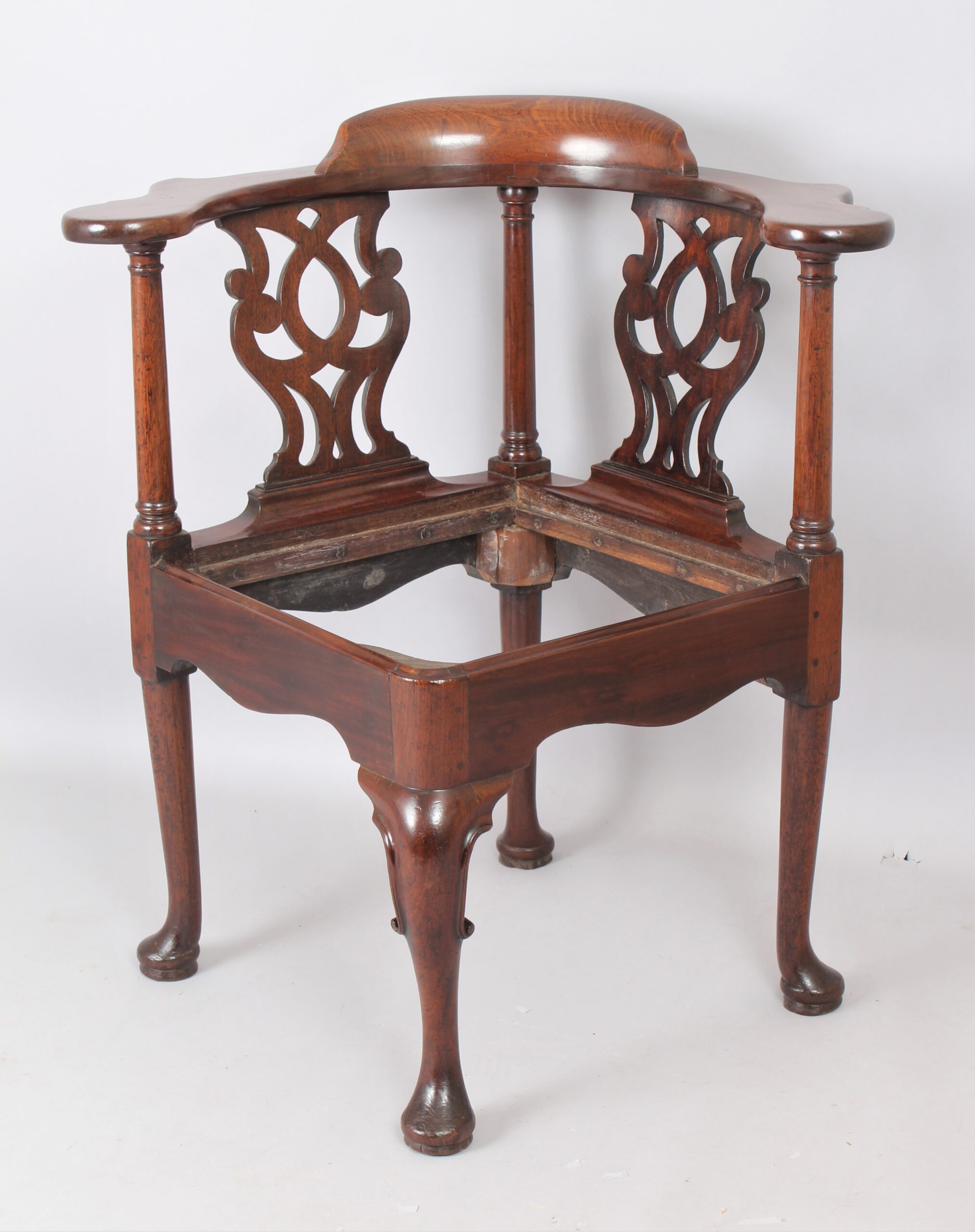 A George II ‘red walnut’ corner chair