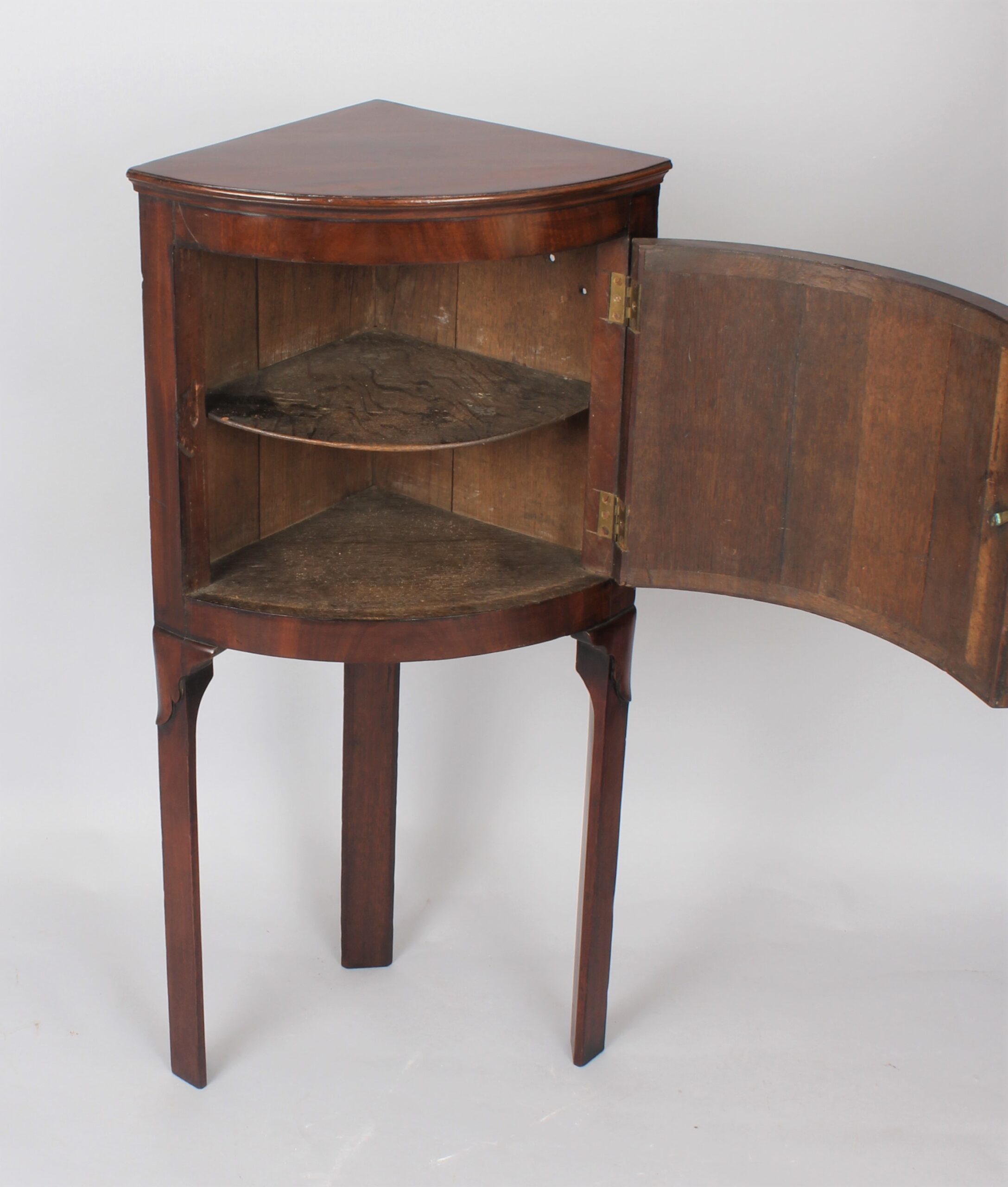 George III period mahogany bow-fronted corner cupboard
