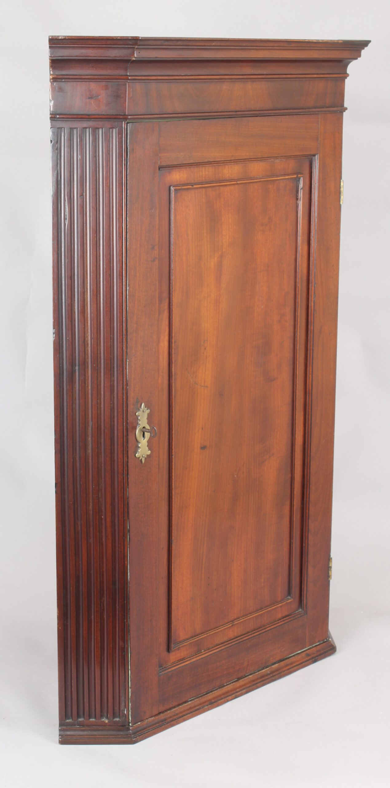 George III period small mahogany corner cupboard