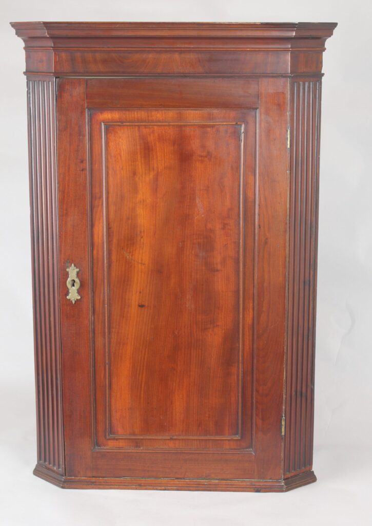 George III period small mahogany corner cupboard