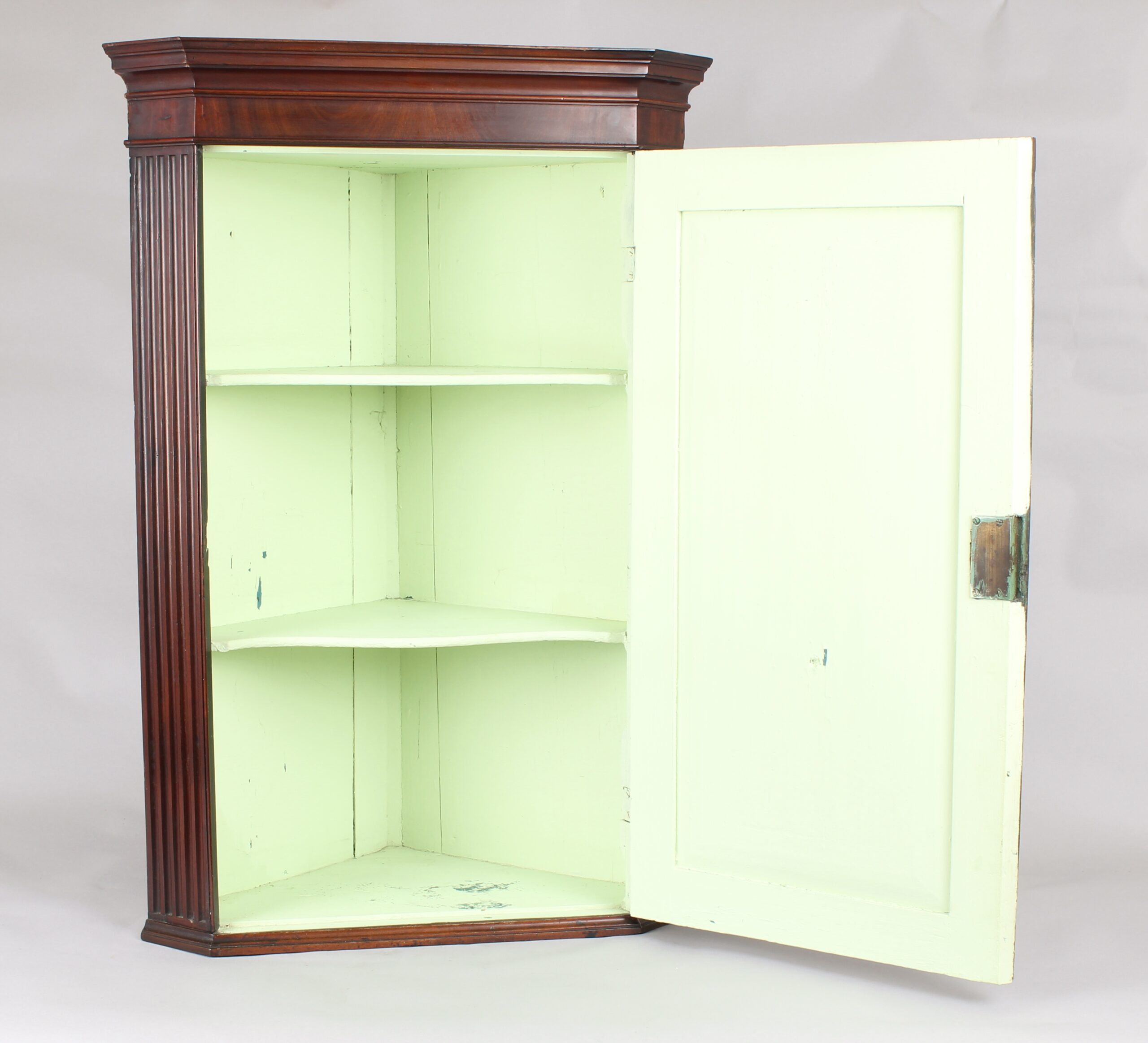 George III period small mahogany corner cupboard
