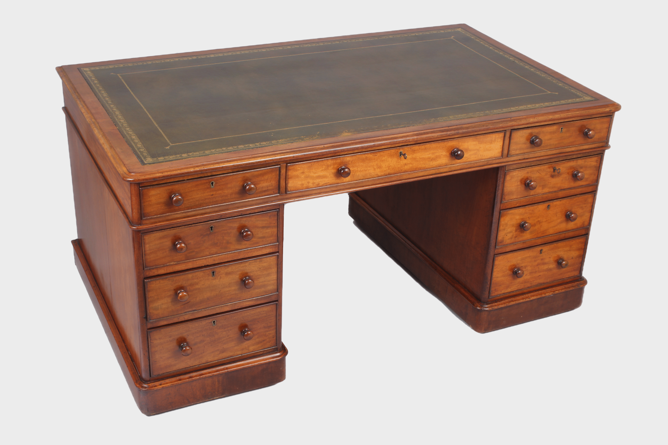 A William IV mahogany three part free standing pedestal desk
