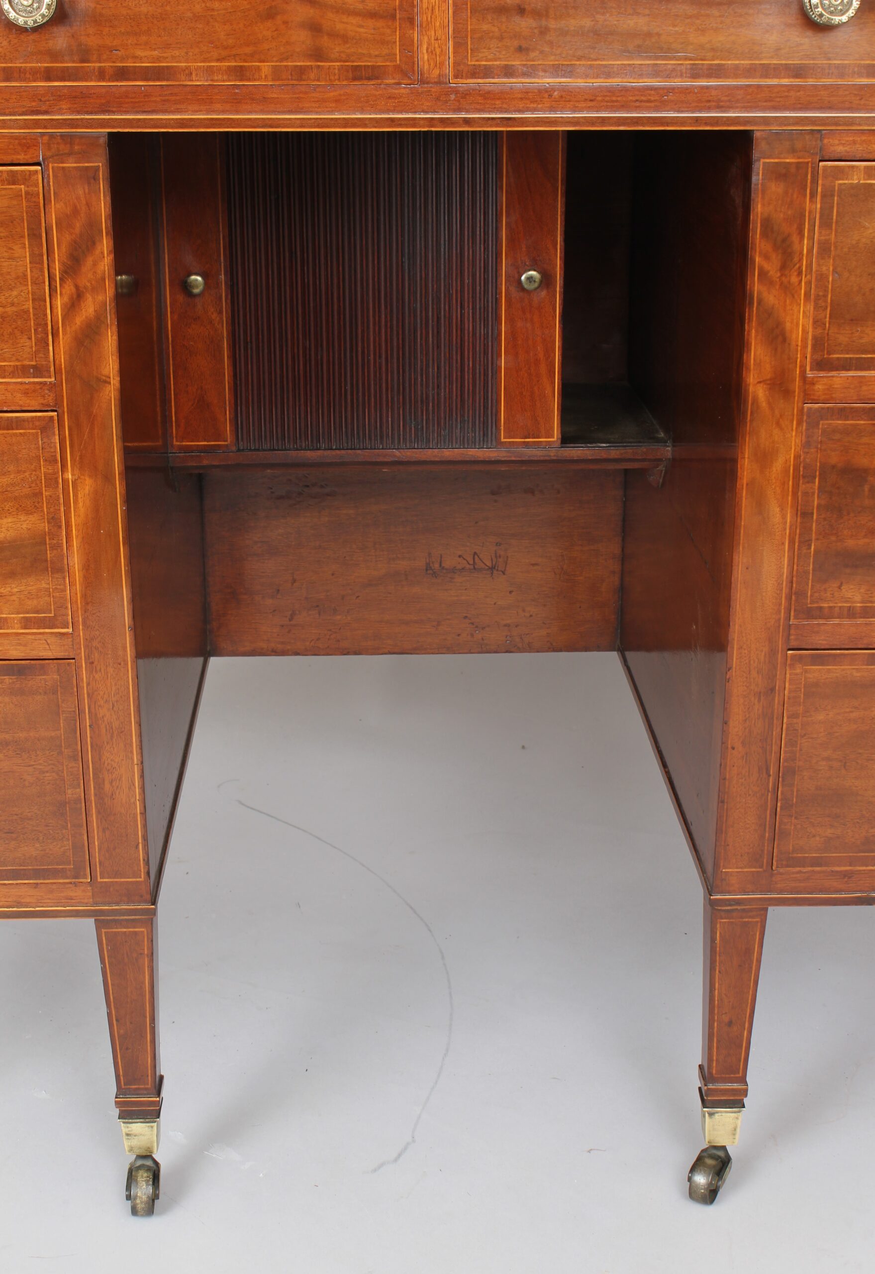 Late 18th century Sheraton period mahogany kneehole dressing table