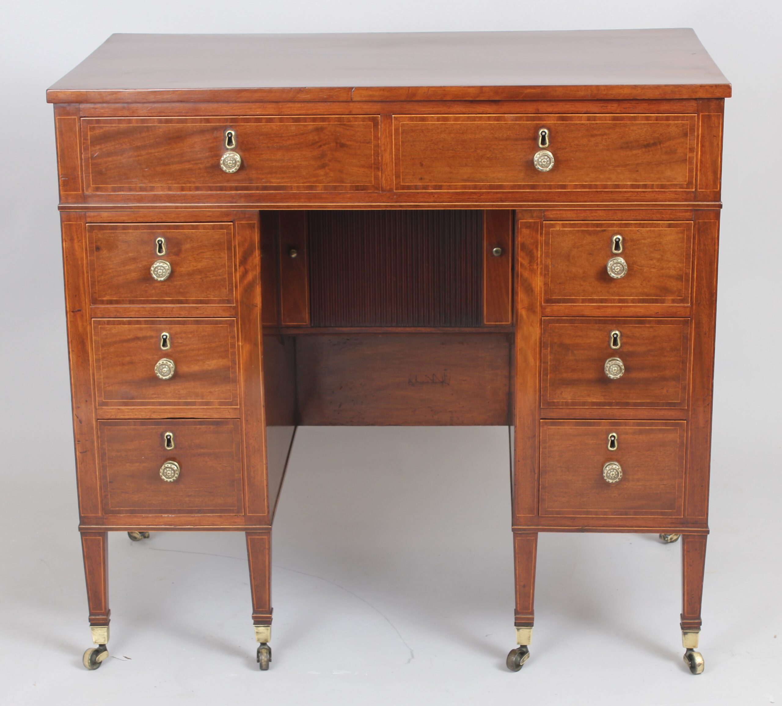 Late 18th century Sheraton period mahogany kneehole dressing table