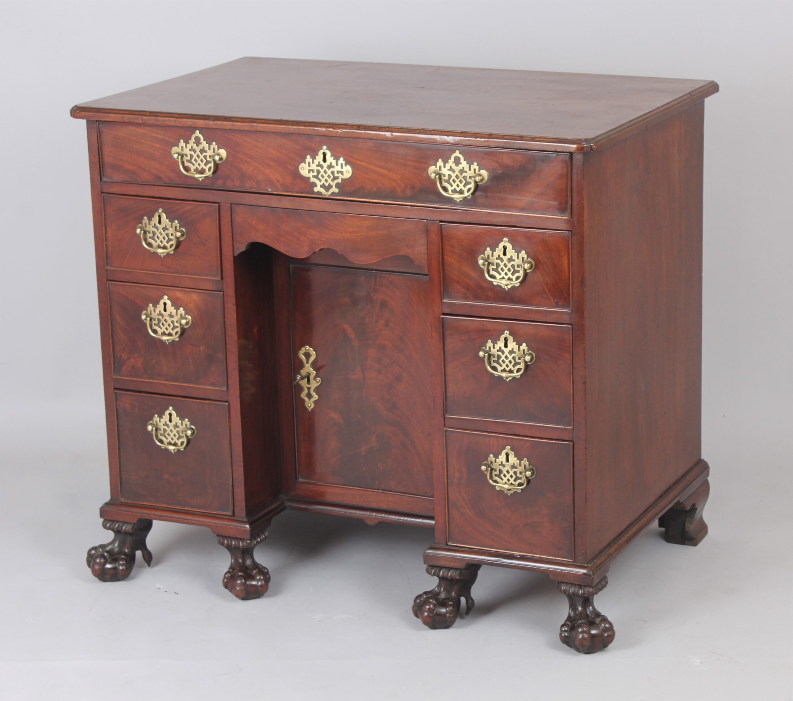 A fine and rare George II period mahogany kneehole desk/dressing table