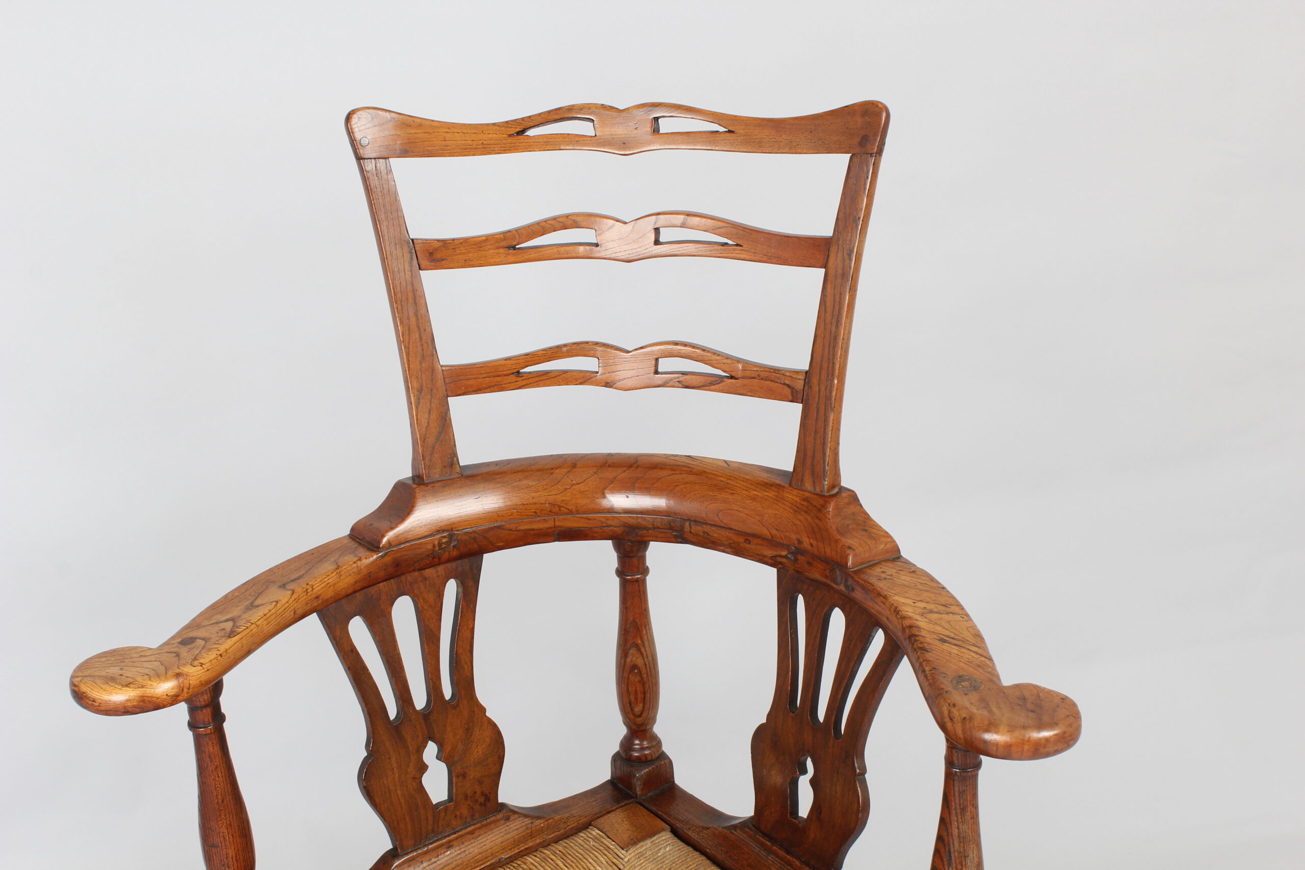 A George III period elm corner-chair